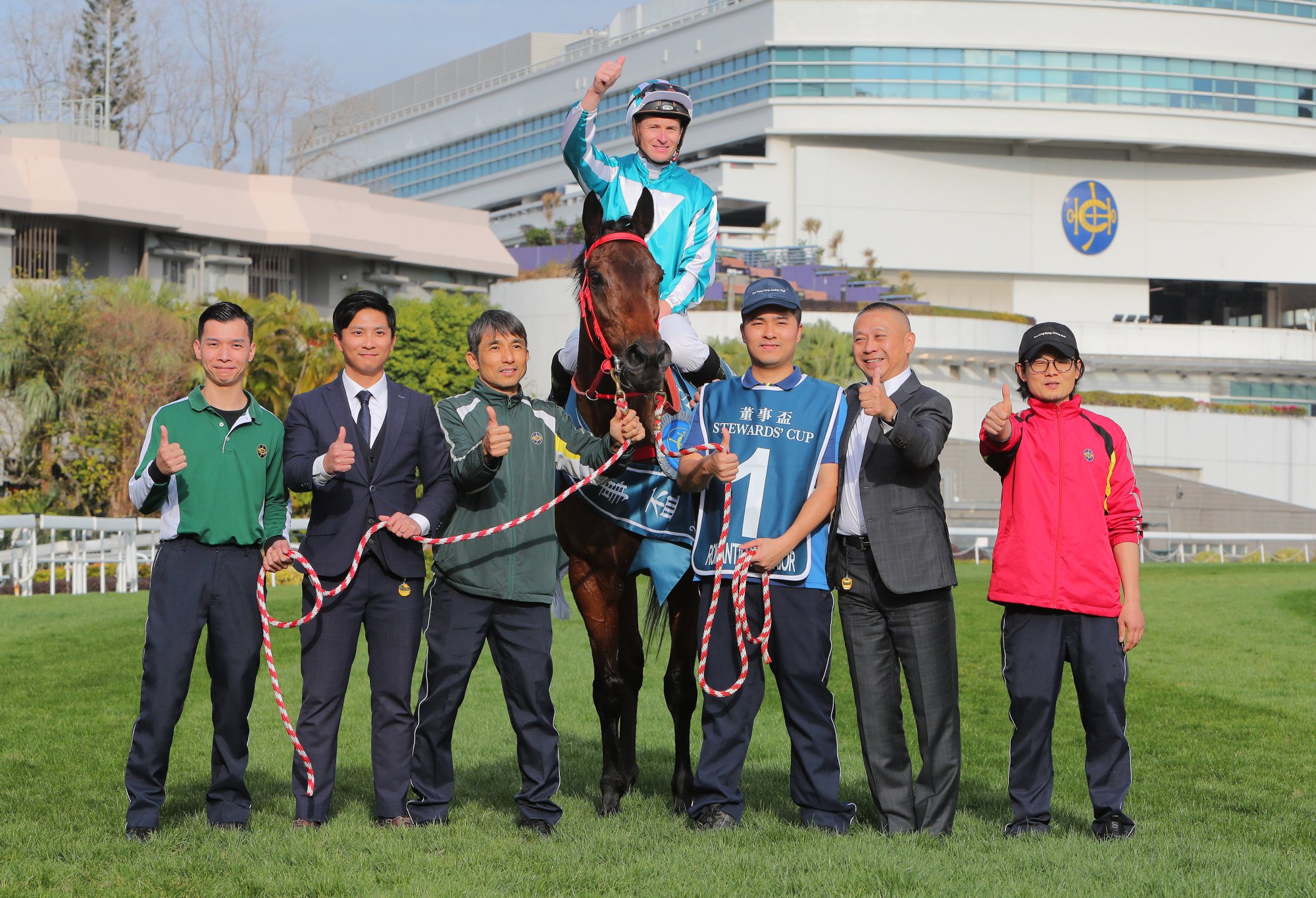 Trainer Danny Shum (second from right), stable staff and jockey James McDonald celebrate Romantic Warrior’s latest triumph. Trainer Danny Shum (second from right), stable staff and jockey James McDonald celebrate Romantic Warrior’s latest triumph.