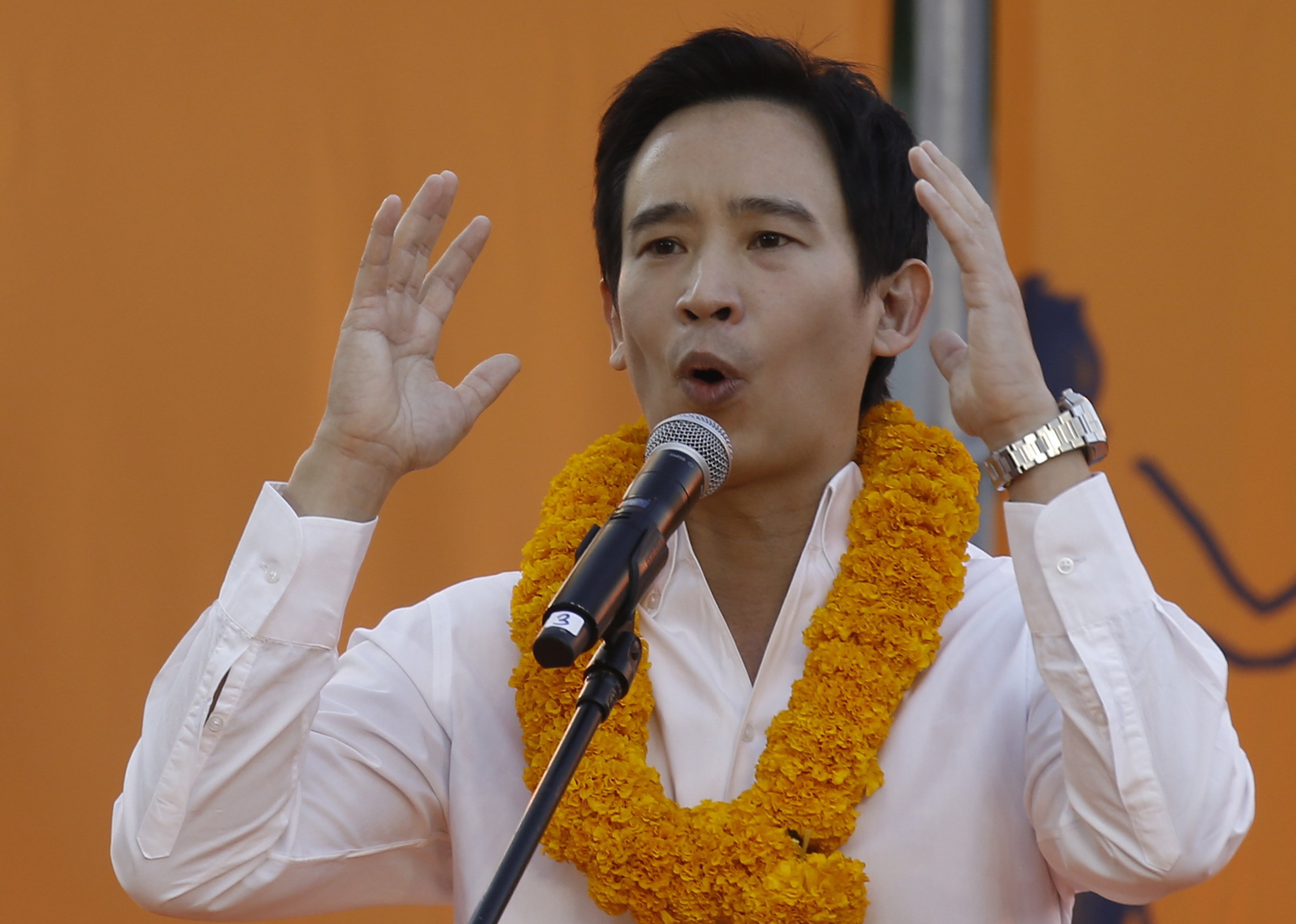 Former party leader Pita Limjaroenrat speaks on stage during a People’s Party election campaign event in Bangkok on Sunday. Photo: EPA