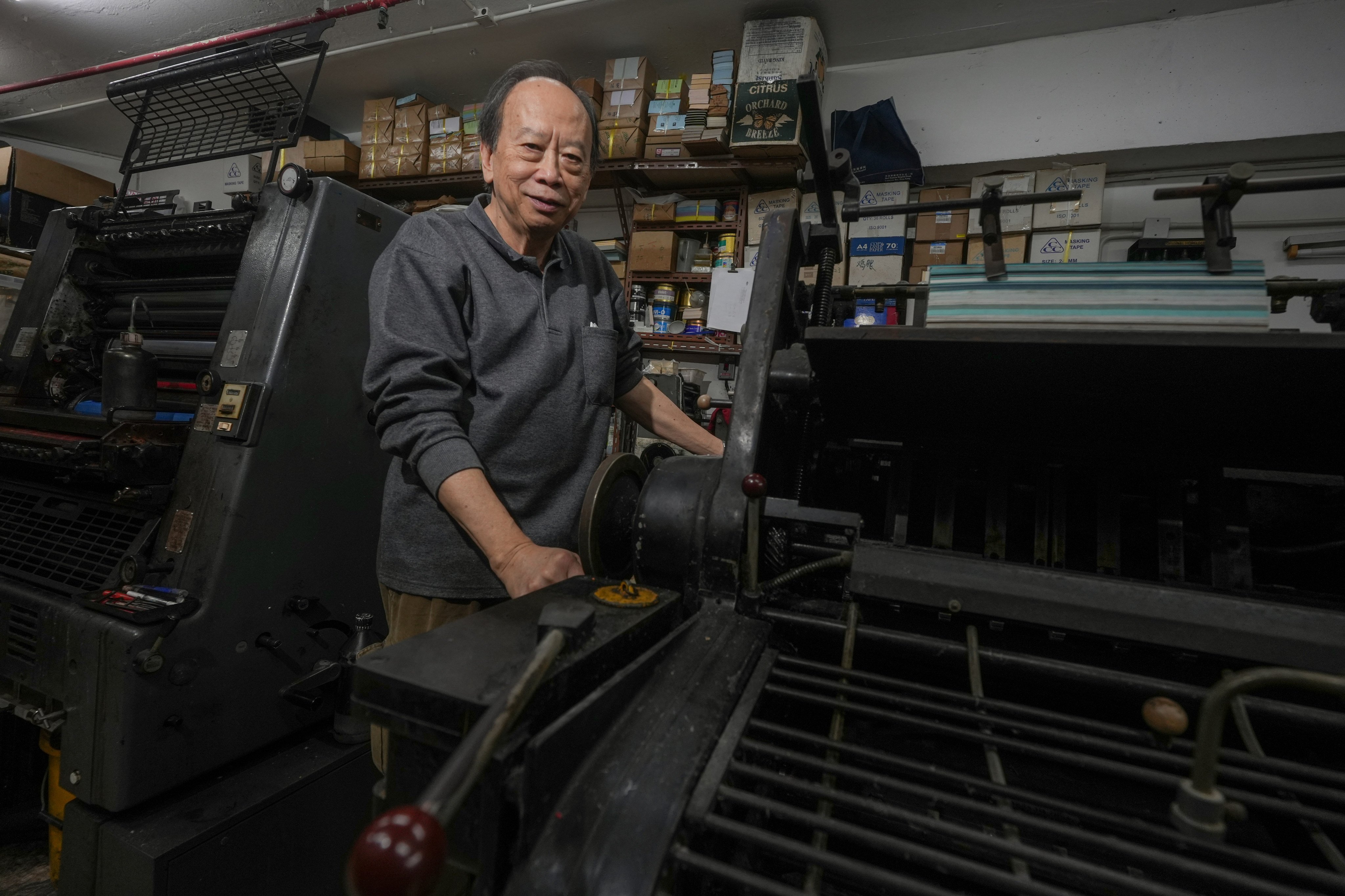 Leung Kwok-hung, 76, preserves Hong Kong’s movable type printing legacy through workshops, defying industry decline with a bold lease renewal. Photo: Sun Yeung