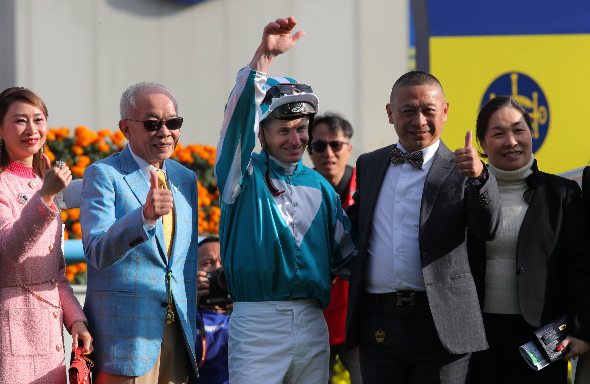 Owner Peter Lau (second from left), jockey James McDonald and trainer Danny Shum (second from right) celebrate Romantic Warrior’s Stewards’ Cup win. Owner Peter Lau (second from left), jockey James McDonald and trainer Danny Shum (second from right) celebrate Romantic Warrior’s Stewards’ Cup win.