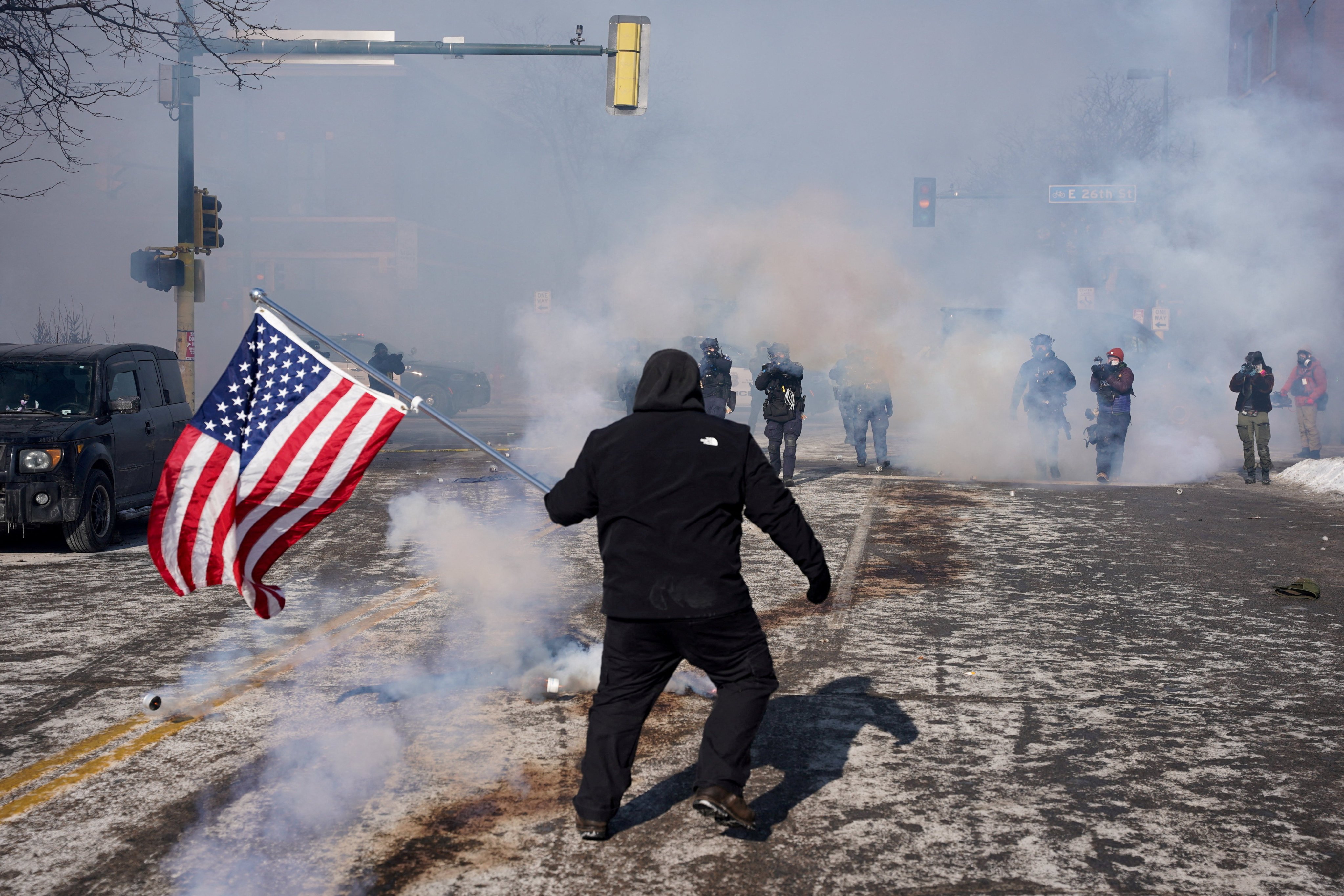 Clashes at the scene where federal agents fatally shot Alex Pretti on Saturday. Photo: Reuters