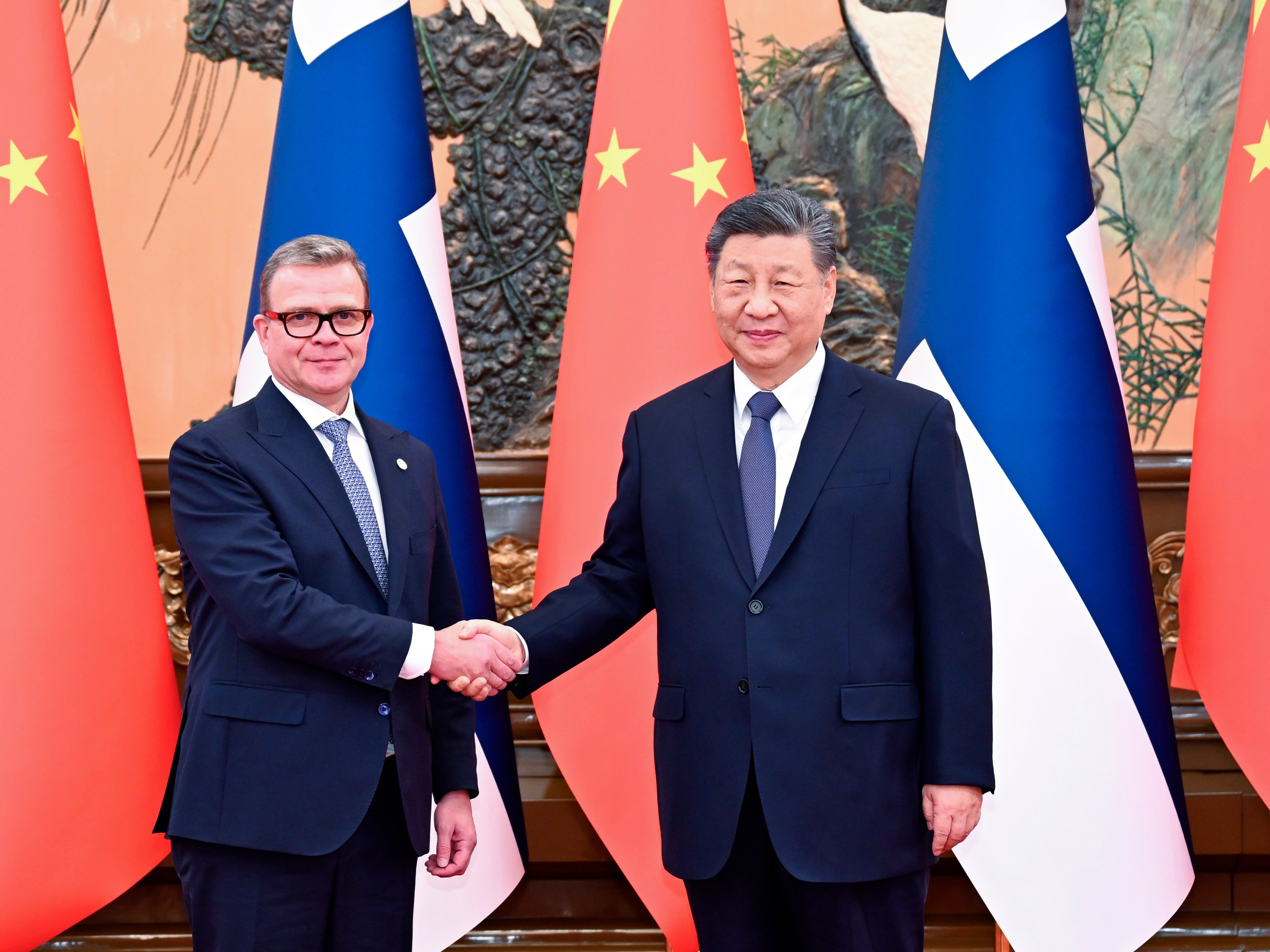 Chinese President Xi Jinping greets Finnish Prime Minister Petteri Orpo at the Great Hall of the People, in Beijing on Tuesday. Photo: Xinhua
