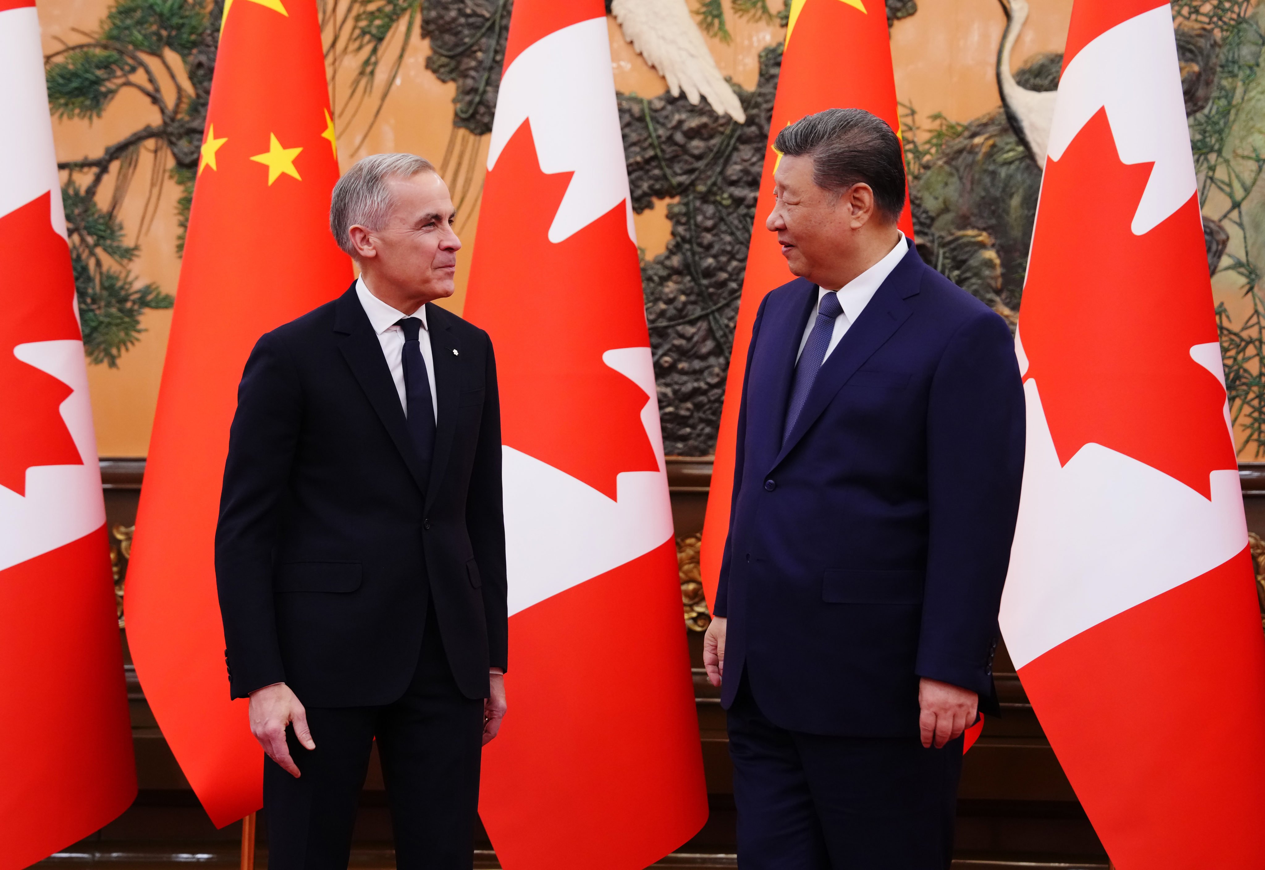 Chinese President Xi Jinping receives Canadian Prime Minister Mark Carney. (Photo: The Canadian Press via AP)