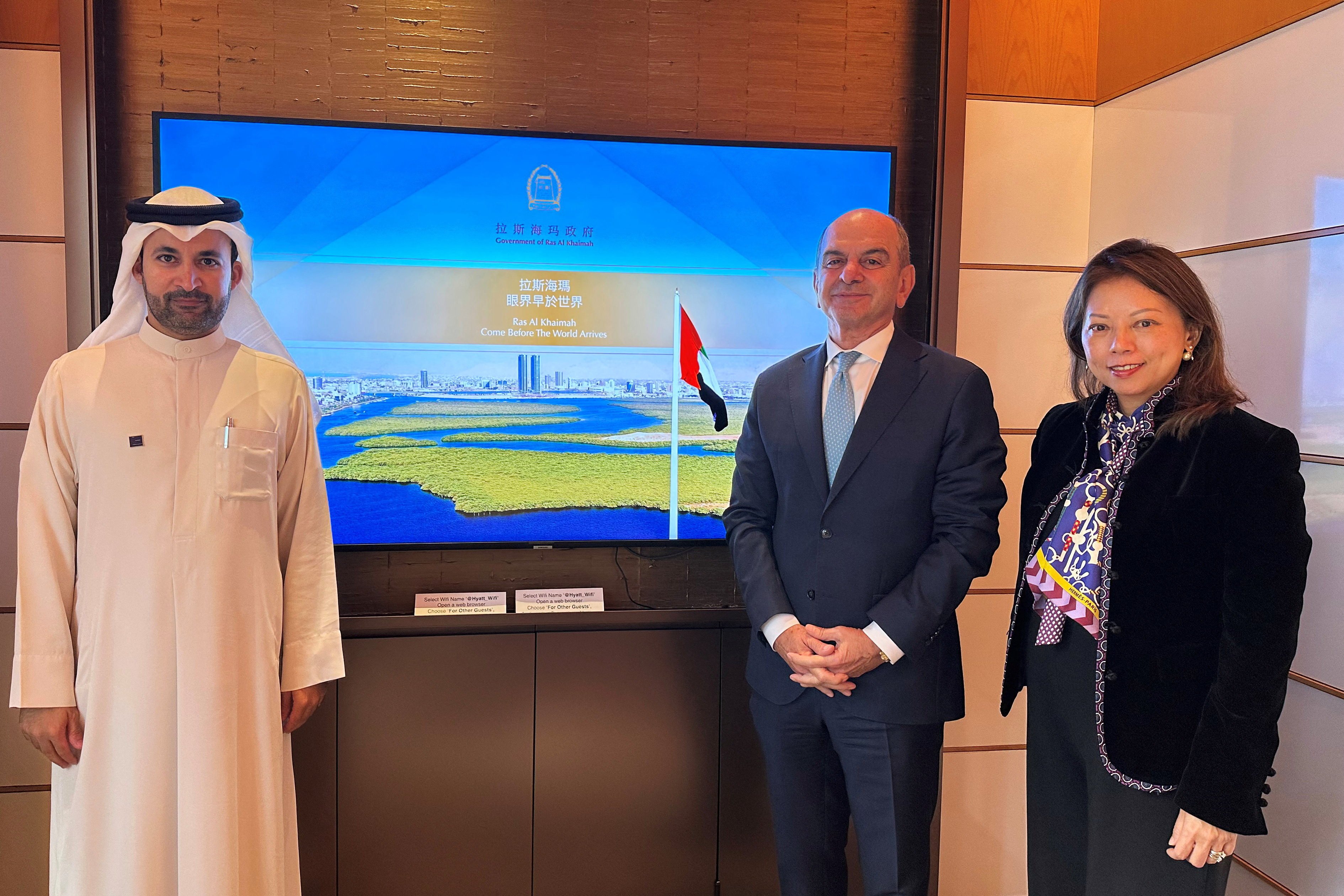 Marjan CEO Abdulla Al Abdouli, RAK Properties CEO Sameh Muhtadi and Ras Al Khaimah ruler’s advisor Alma Au Yeung pose for pictures during a delegation visit in Hong Kong. Photo: Reuters