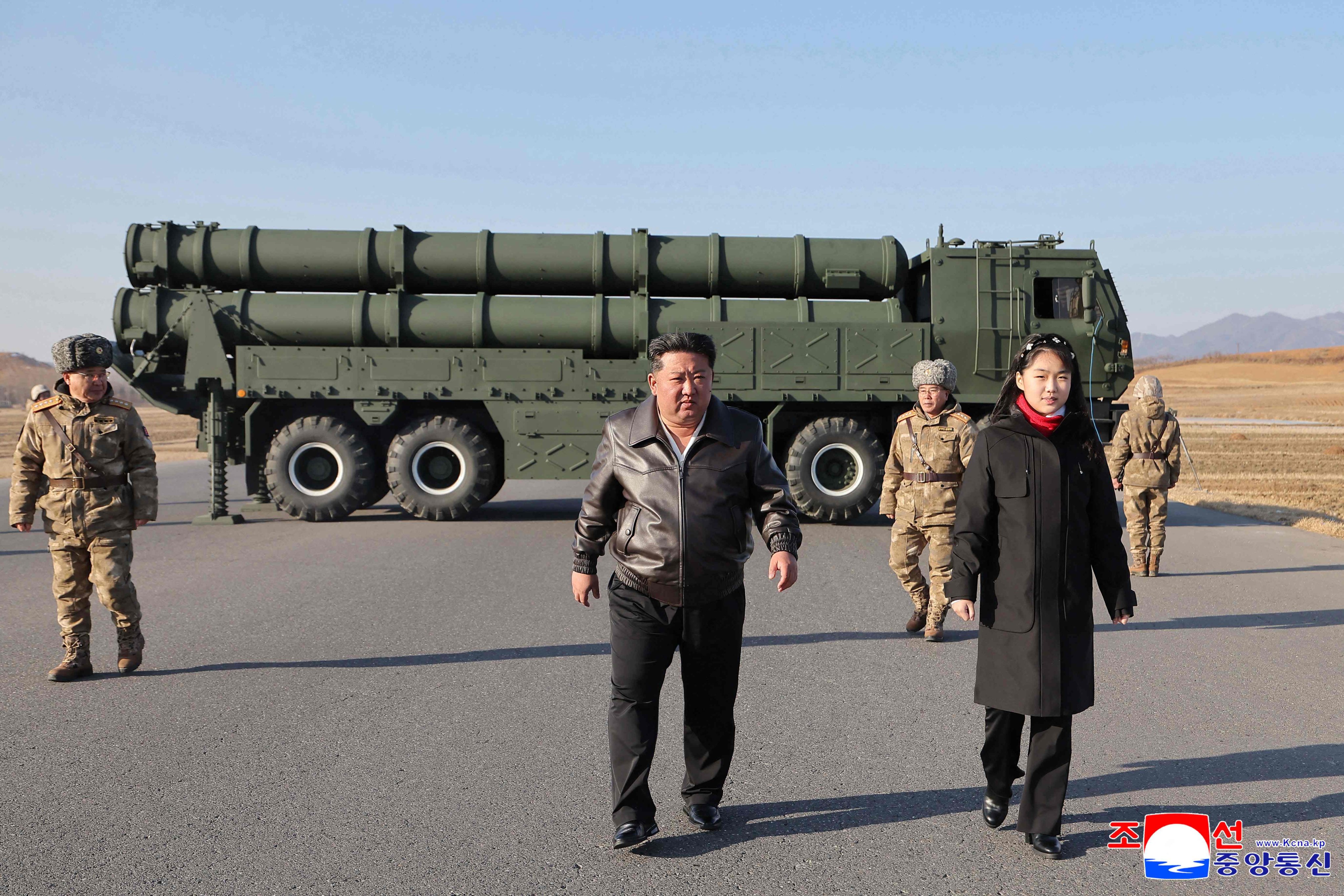 North Korean leader Kim Jong-un inspects a test firing of a rocket launcher system on Tuesday. Photo: KCNA via KNS/AFP