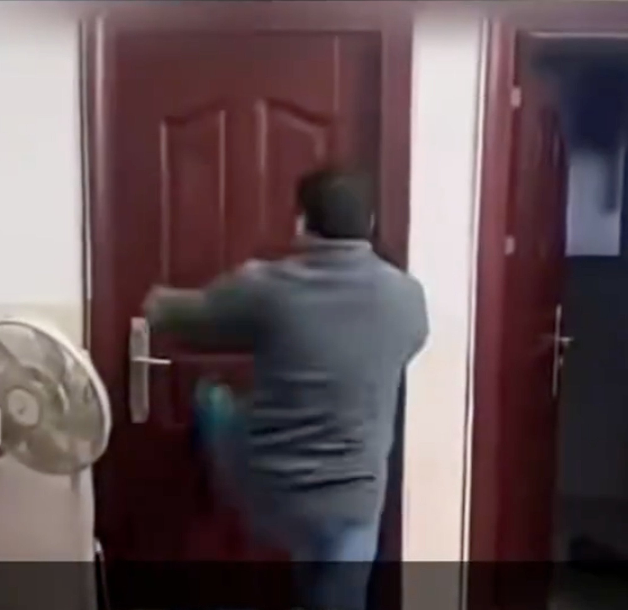 The man kicks his daughter’s bedroom door after smashing up a hairdryer. Photo: The Paper