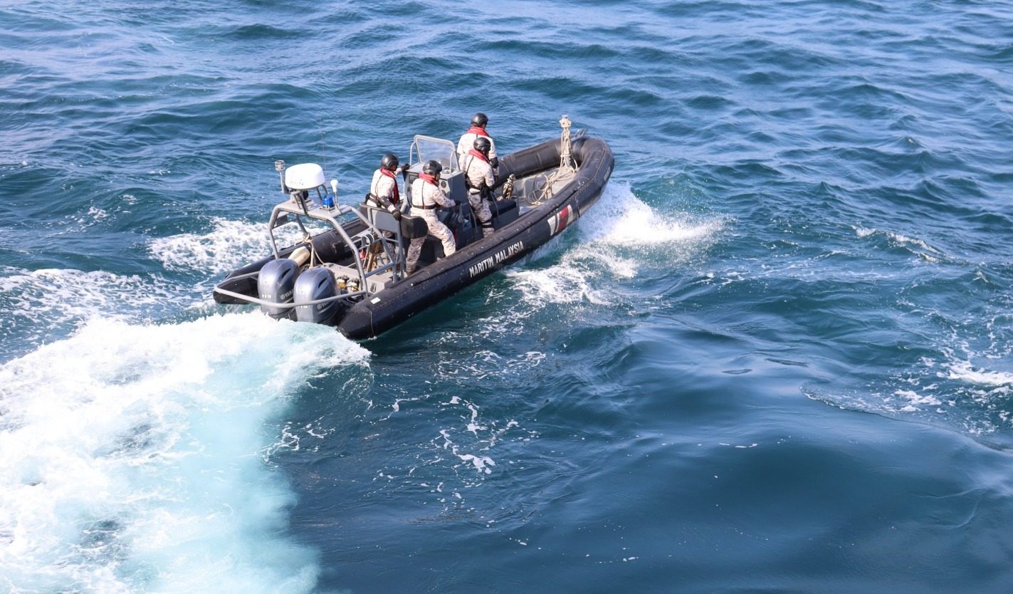 Several people were detained aboard an unregistered boat during an operation conducted by Malaysia’s Maritime Enforcement Agency on Monday. Photo: Facebook/maritimmalaysia