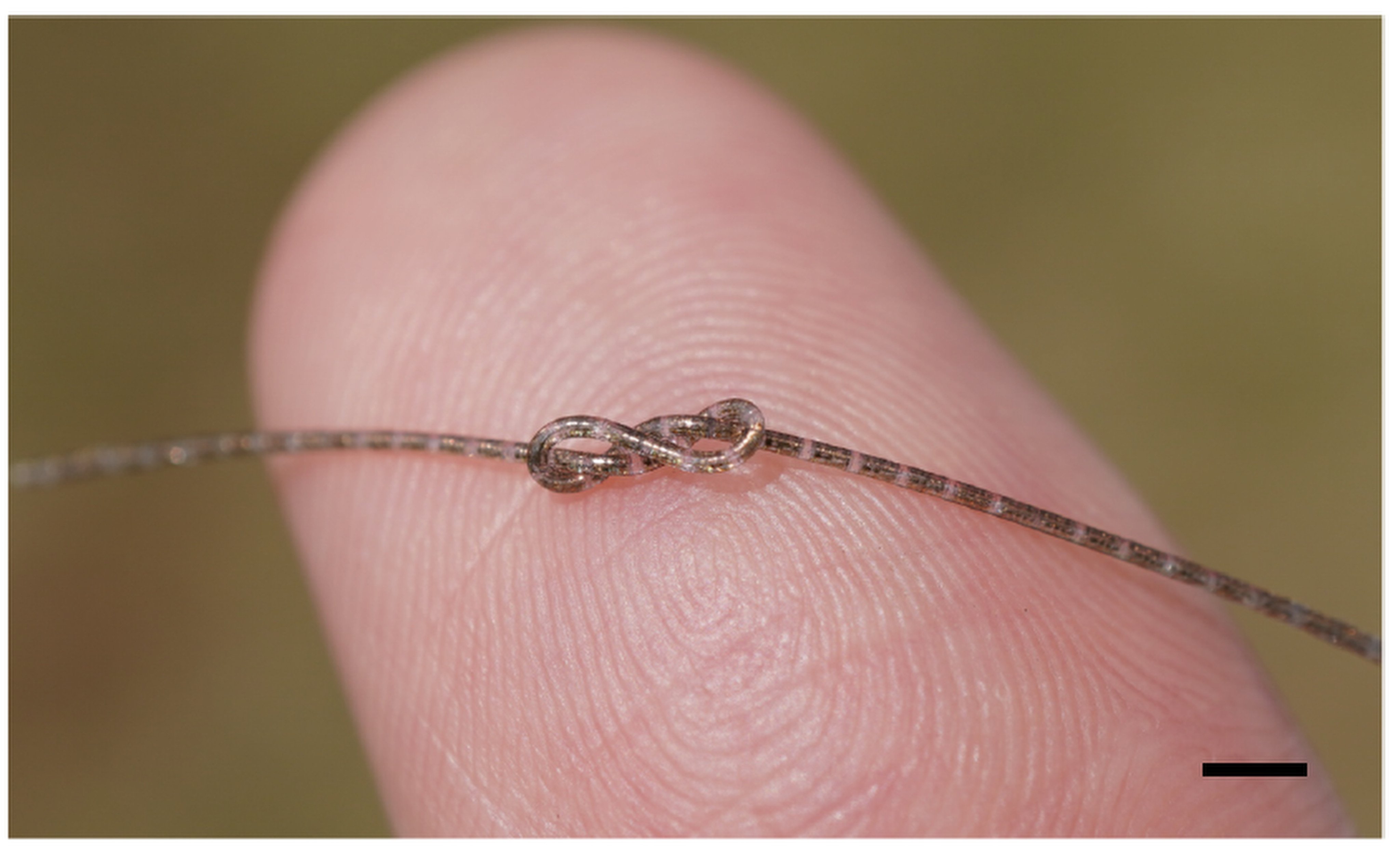 A fibre integrated circuit is a novel electronic device that is as thin as a strand of human hair. Photo: Handout