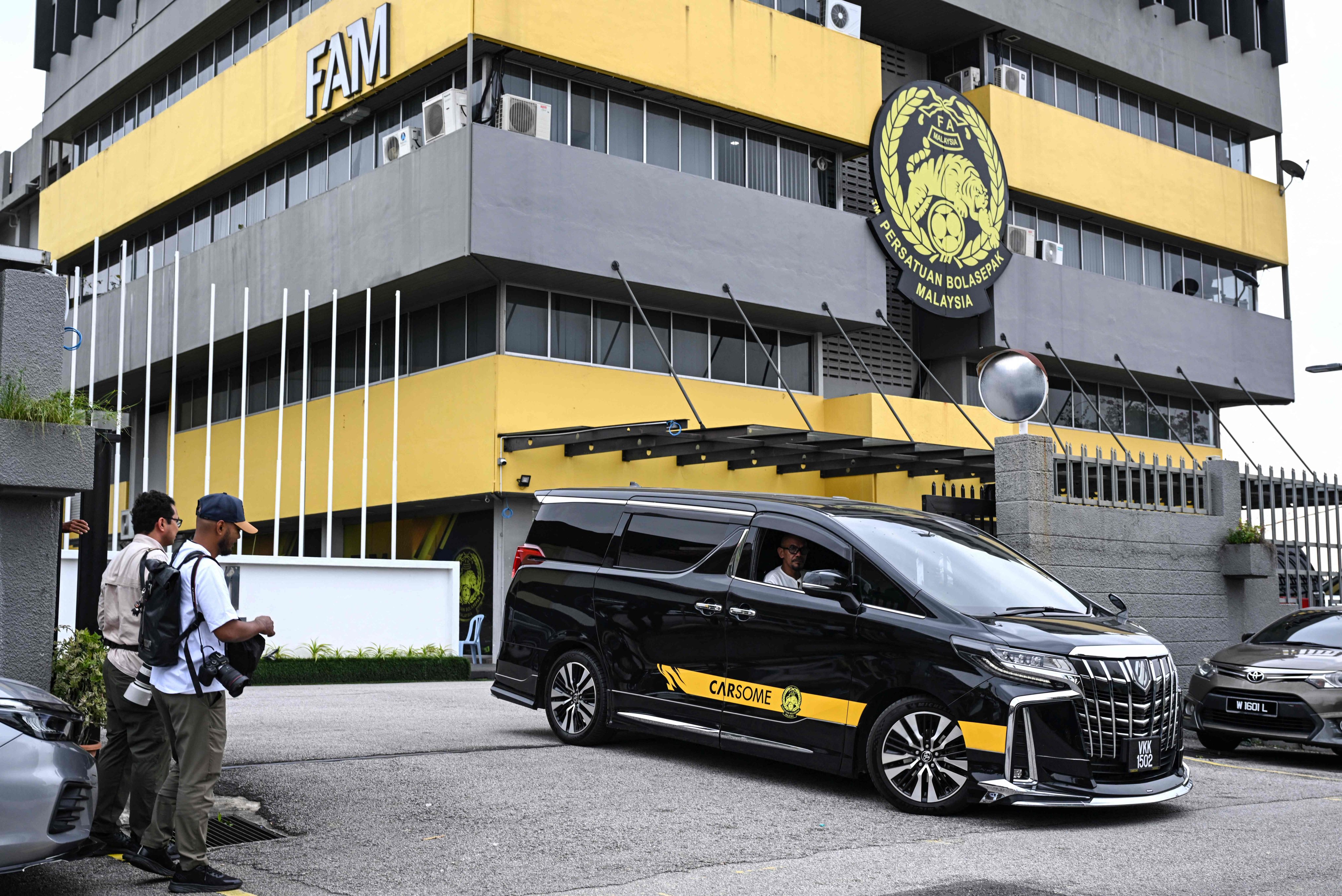 A Malaysian football association (FAM) vehicle leaving the FAM’s headquarters in Kuala Lumpur on Wednesday. Photo: AFP