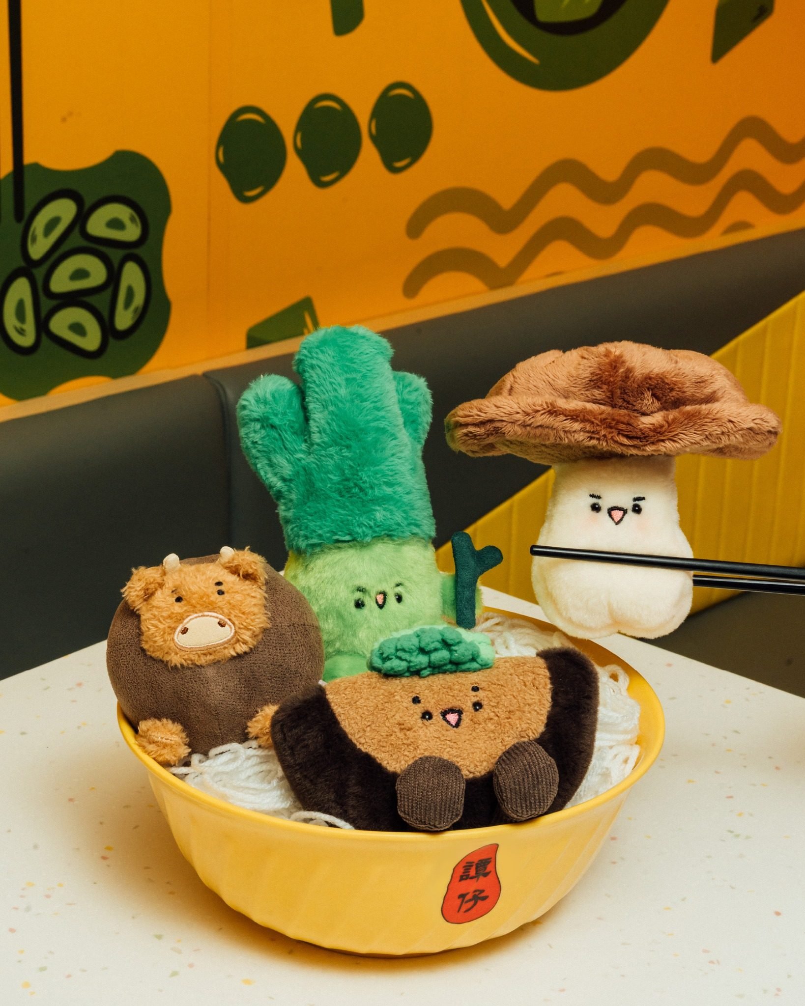 Food-theme collectibles are one way Tam Jai is trying to attract customers. Photo: Instagram/@tamjai-hk