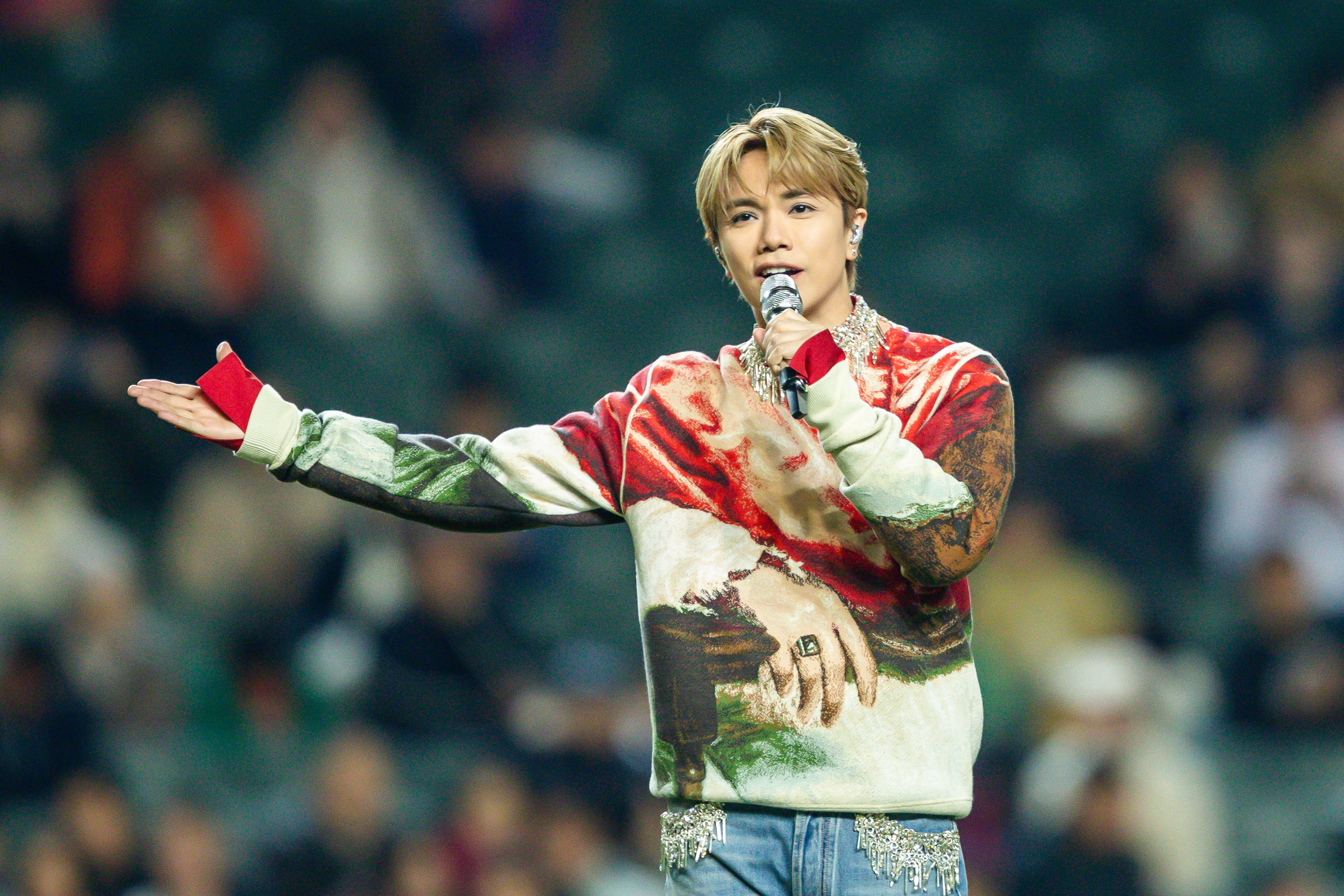 Cantopop singer Hins Cheung performs during half-time at the Legends Assemble match between Real Madrid Legends and Barcelona Heroes at Hong Kong Stadium on December 20, 2024. Photo: Getty Images