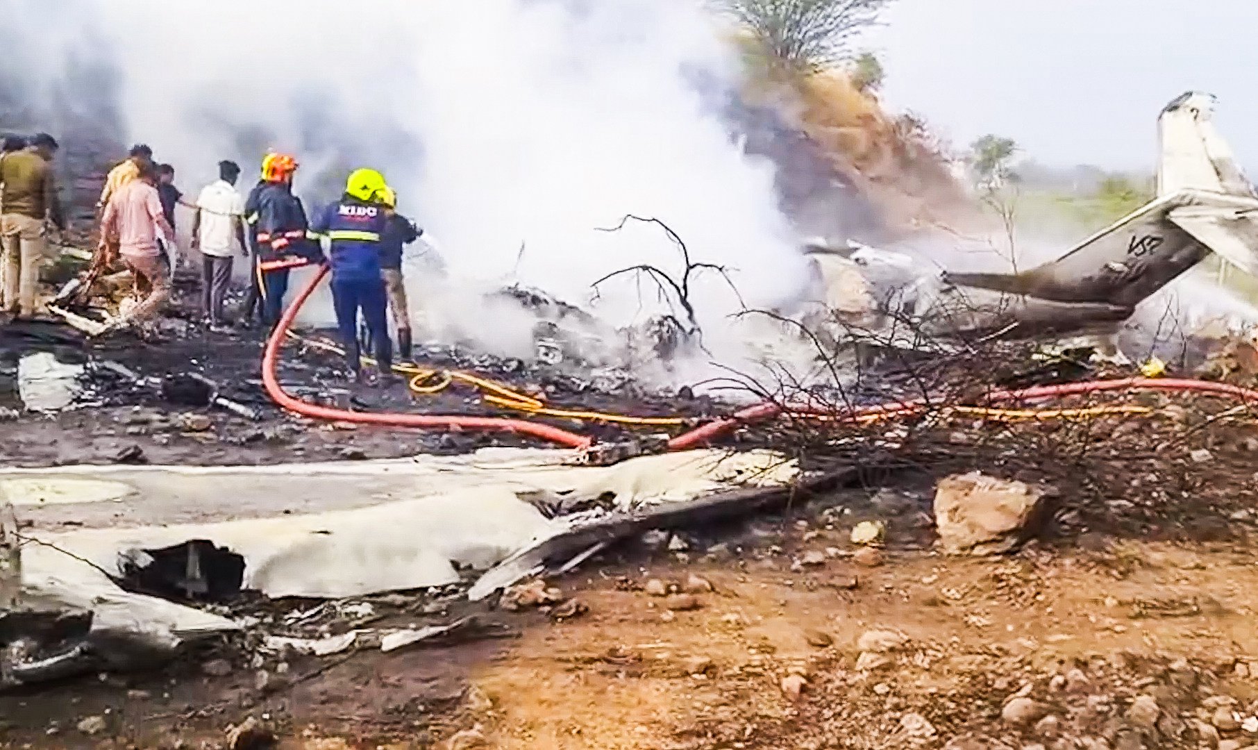 Rescuers work at the site of a plane crash at Baramati airport on Wednesday. Photo: IANS via Xinhua