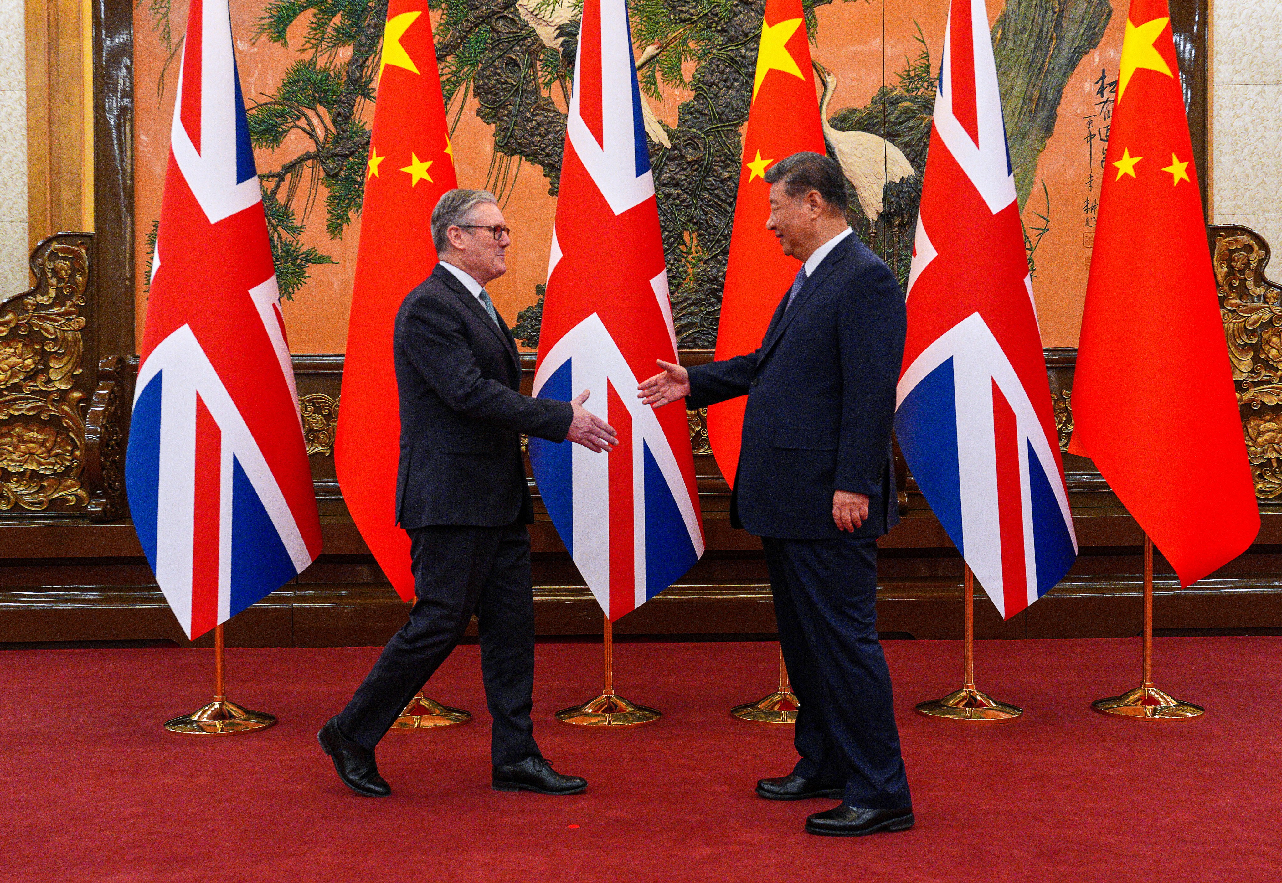 Britain’s Prime Minister Keir Starmer, left, greets Chinese President Xi Jinping during a meeting in Beijing. Photo: Carl Court/Pool Photo via AP