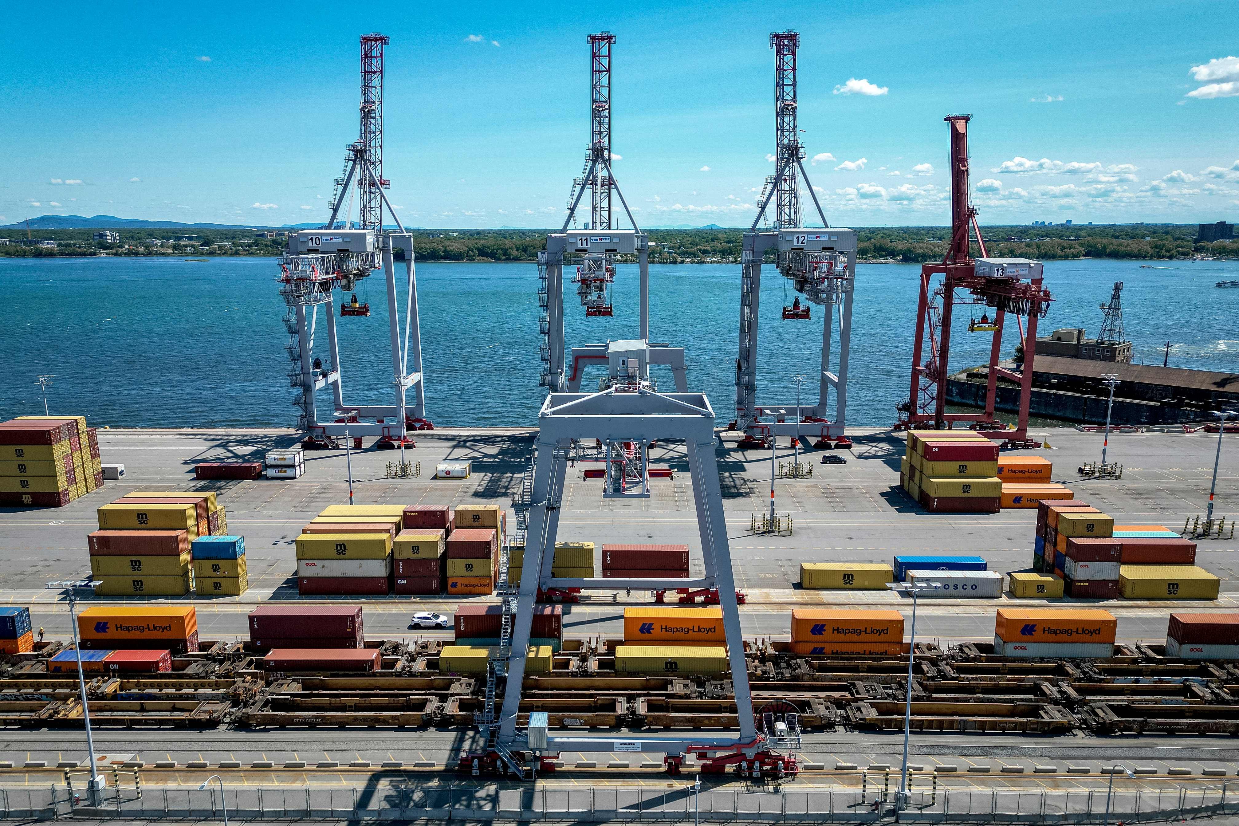 Shipping containers are stacked at a port in Montreal, Quebec, Canada, on August 1, 2025. While the unravelling of globalisation has been a major theme for some time, the primacy of national security and geopolitics is a relatively new phenomenon that is reshaping the global economy and markets. Photo: AFP