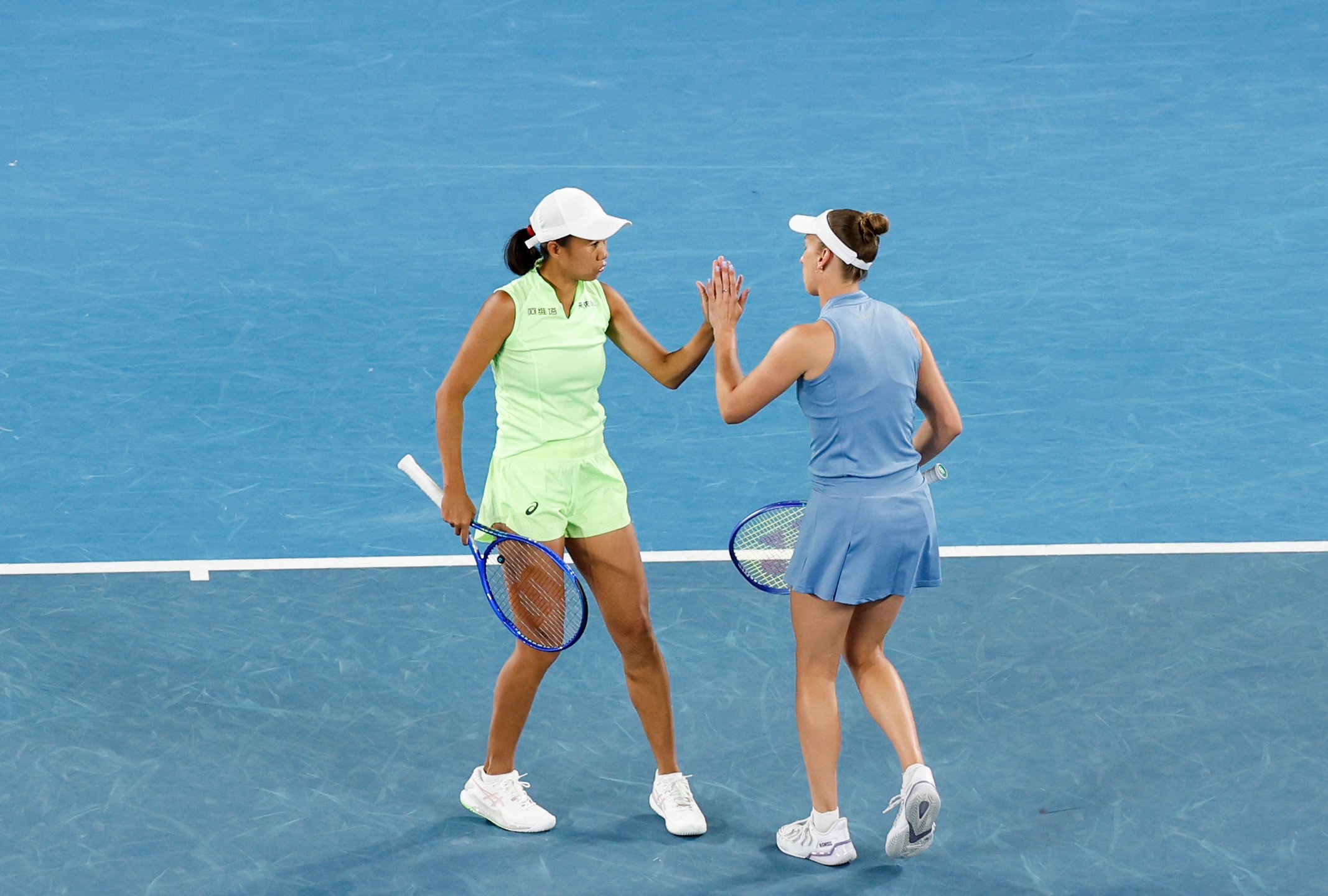 Zhang Shuai (left) and Elise Mertens have reached the final of the women’s doubles at the Australian Open. Photo: Xinhua