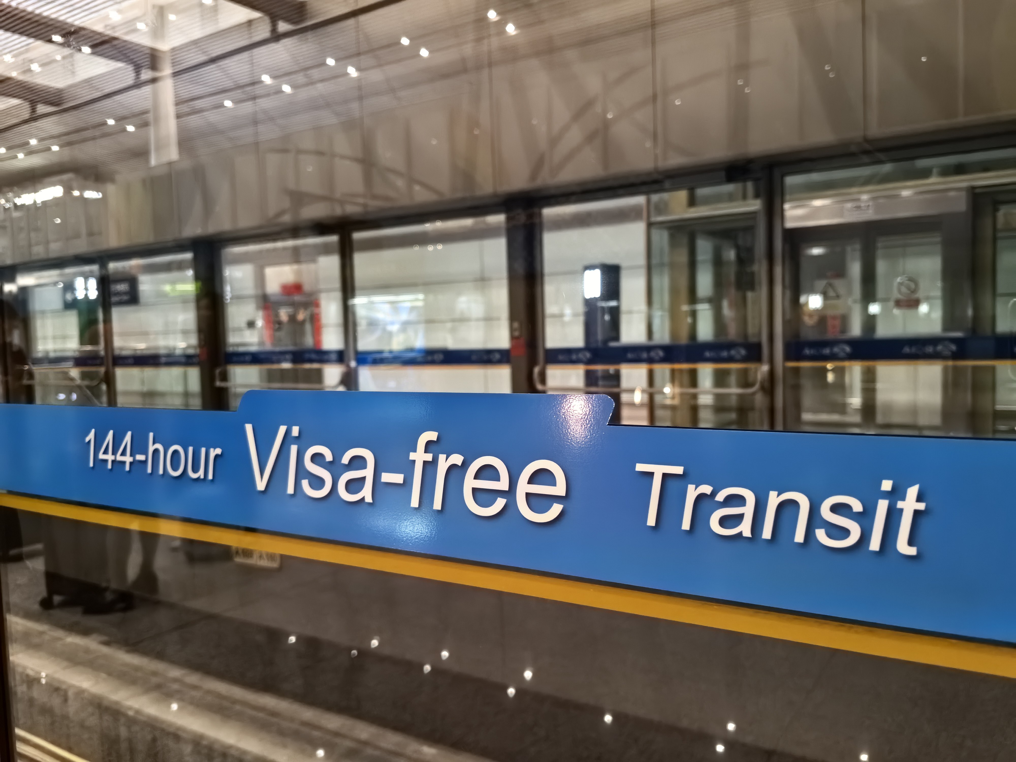 Visa-free transit signage at Beijing Capital International Airport. Photo: Simon Song