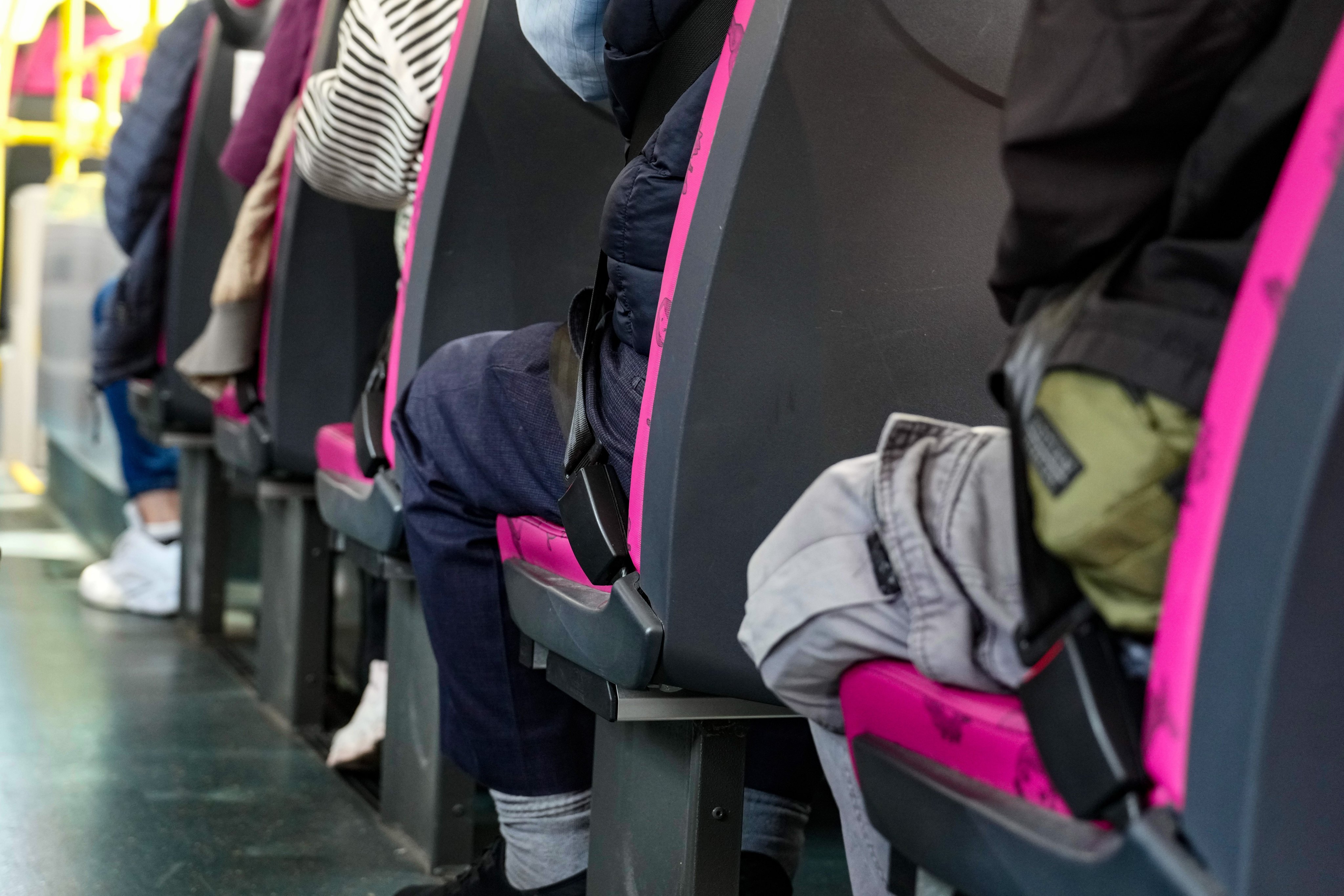 Passengers wear seat belts on a double-decker bus in Hong Kong’s Sham Shui Po on Thursday. Photo: Sam Tsang