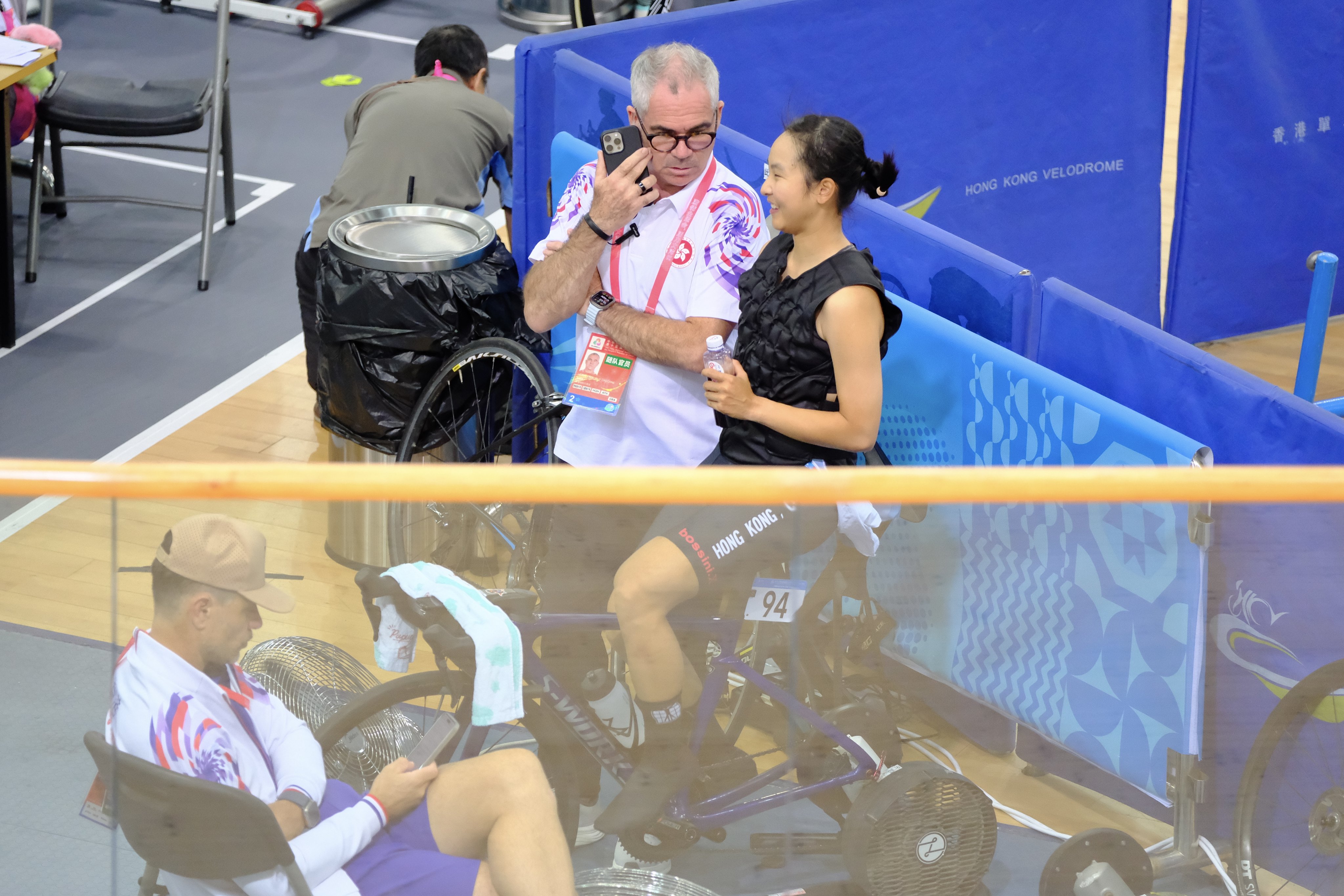 Herve Dagorne (left) talks to star rider Ceci Lee during training at the Hong Kong Velodrome. Photo: Karma Lo