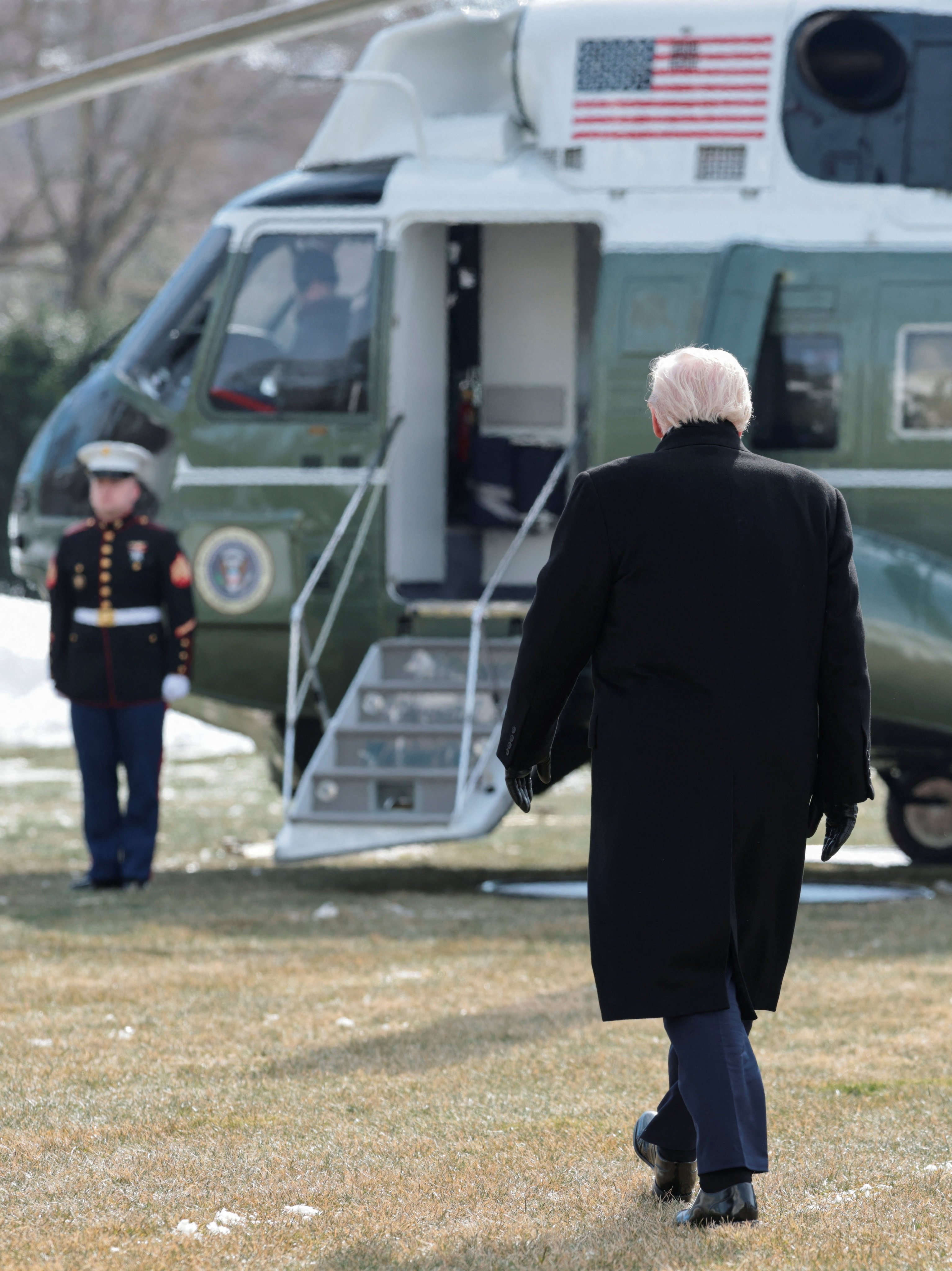 US President Donald Trump walks towards the Marine One to travel to Iowa from the White House on January 27. Photo: Reuters
