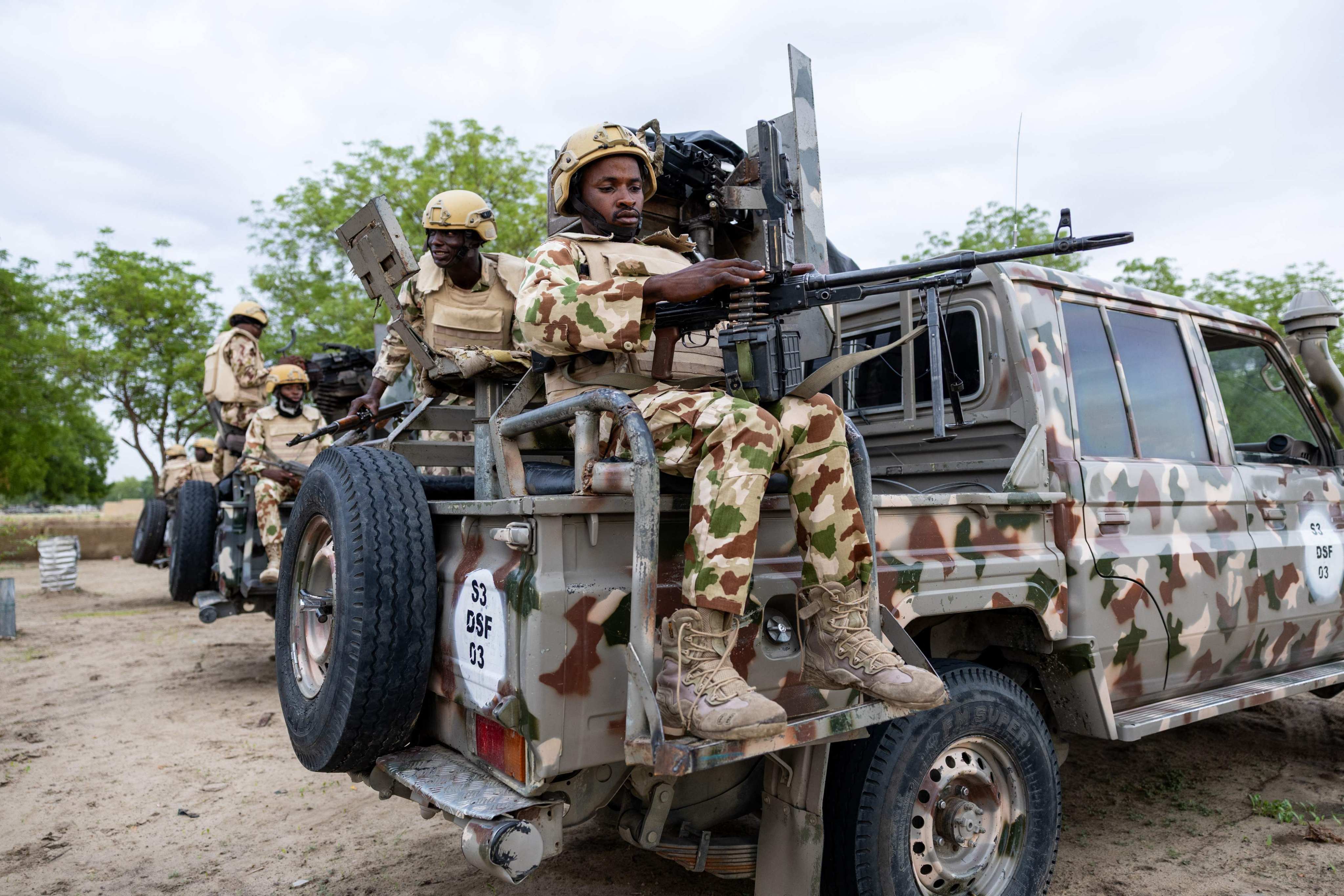 A Nigerian soldier from the Multinational Joint Task Force (MNJTF) loads his machine gun during training at the MNJTF military base, Sector 3 Headquarters, in Monguno, Borno state, Nigeria, on July 5 last year. Photo: AFP