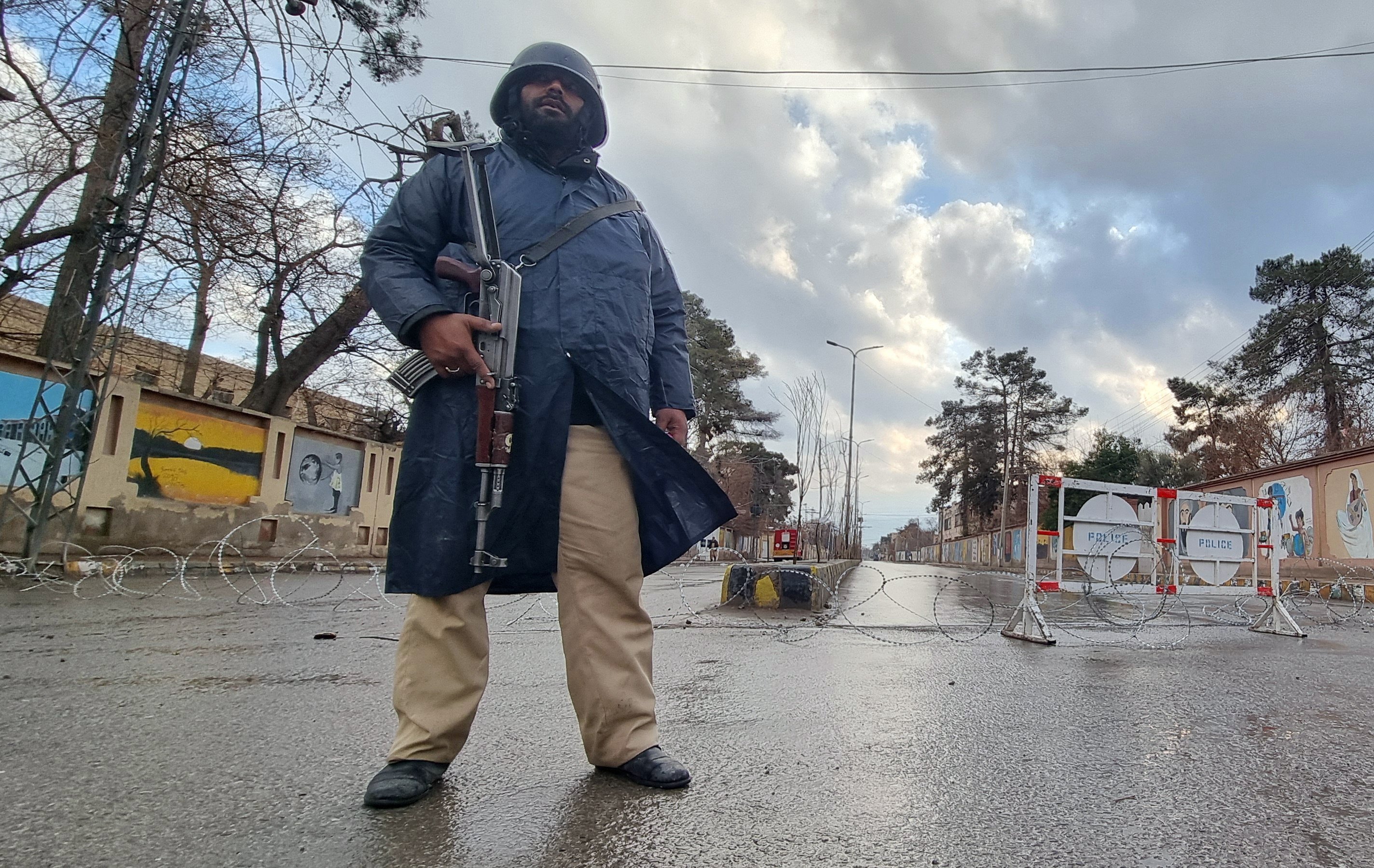 Pakistani security officials stand guard on a road after militants launched coordinated attacks across Balochistan province, in Quetta, Pakistan, on Saturday. Photo: EPA-EFE