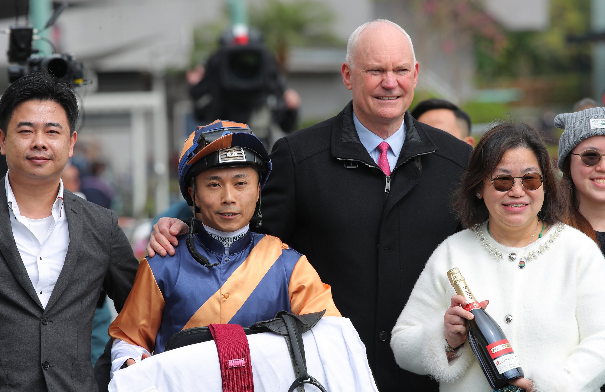 Jockey Matthew Poon, trainer David Hall (second from right) and connections of Shotgun celebrate his victory. Jockey Matthew Poon, trainer David Hall (second from right) and connections of Shotgun celebrate his victory.