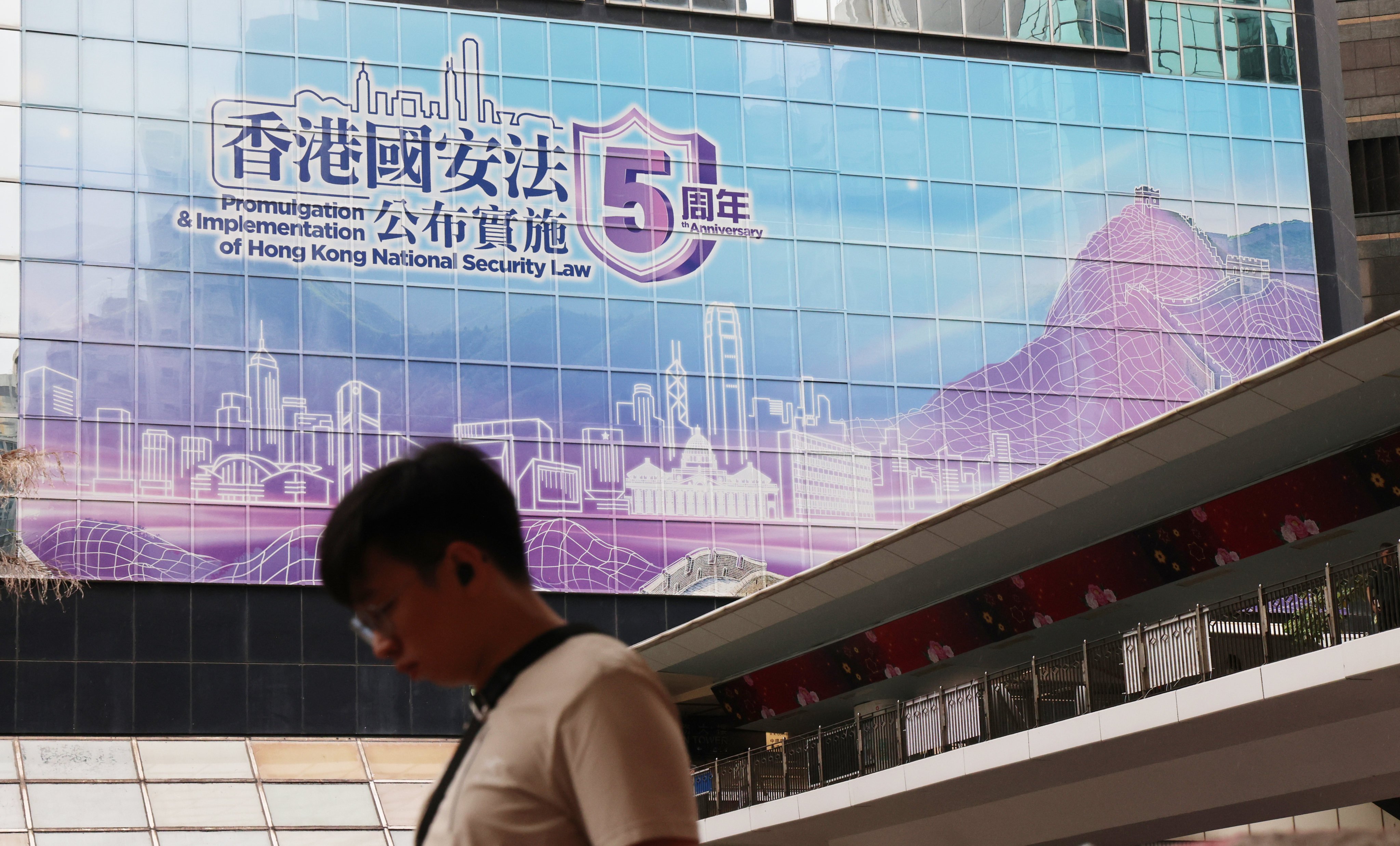 A poster in Wan Chai commemorating the fifth anniversary of the 2020 national security law. Photo: Jelly Tse