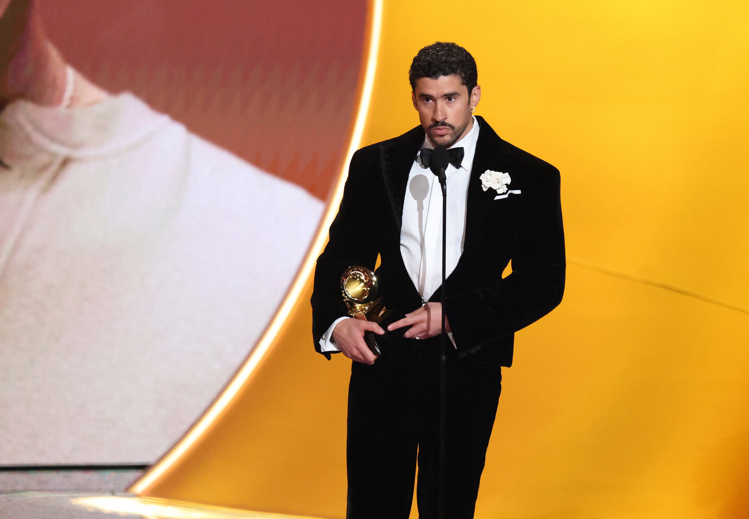 Bad Bunny accepts the album of the year award for Debí Tirar Más Fotos at the 68th annual Grammy Awards in Los Angeles, California. Photo: TNS