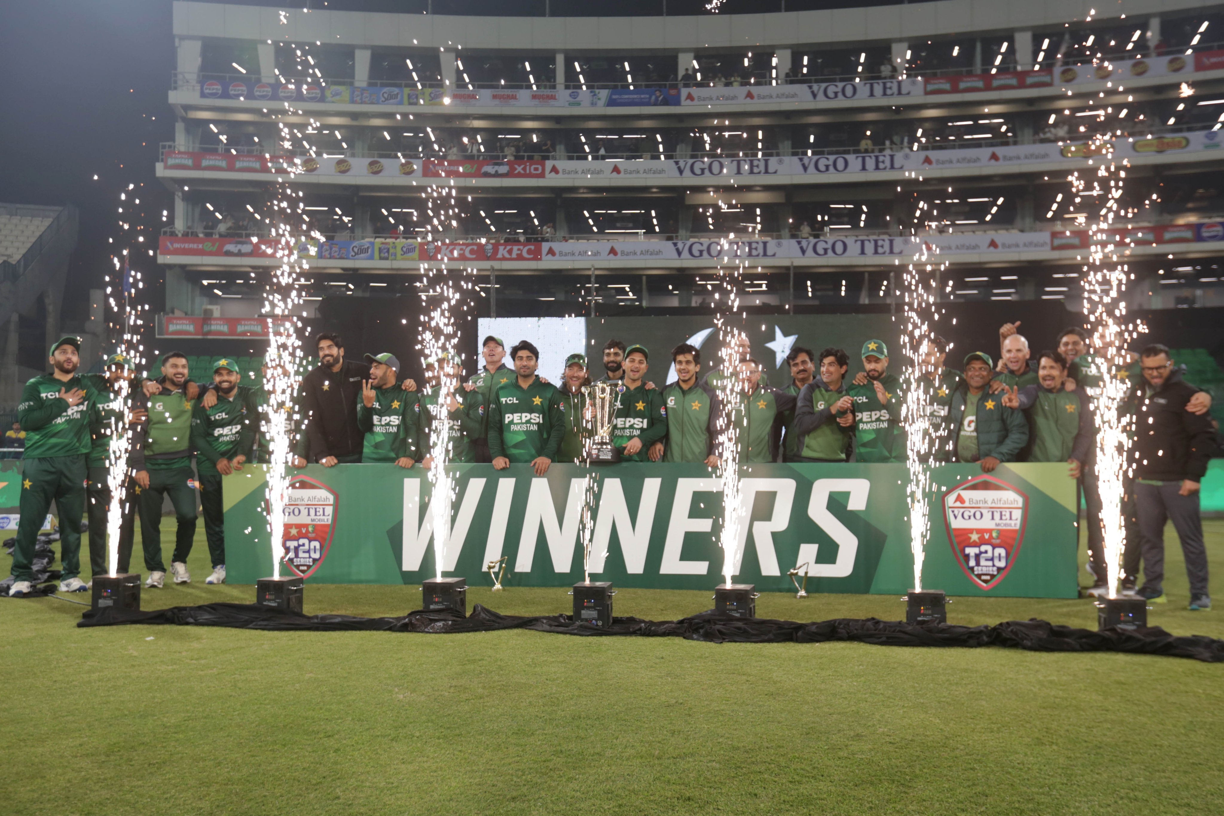 Pakistani players celebrate  winning the series and the third T20 international cricket match between Pakistan and Australia in Lahore on Sunday. Photo: EPA