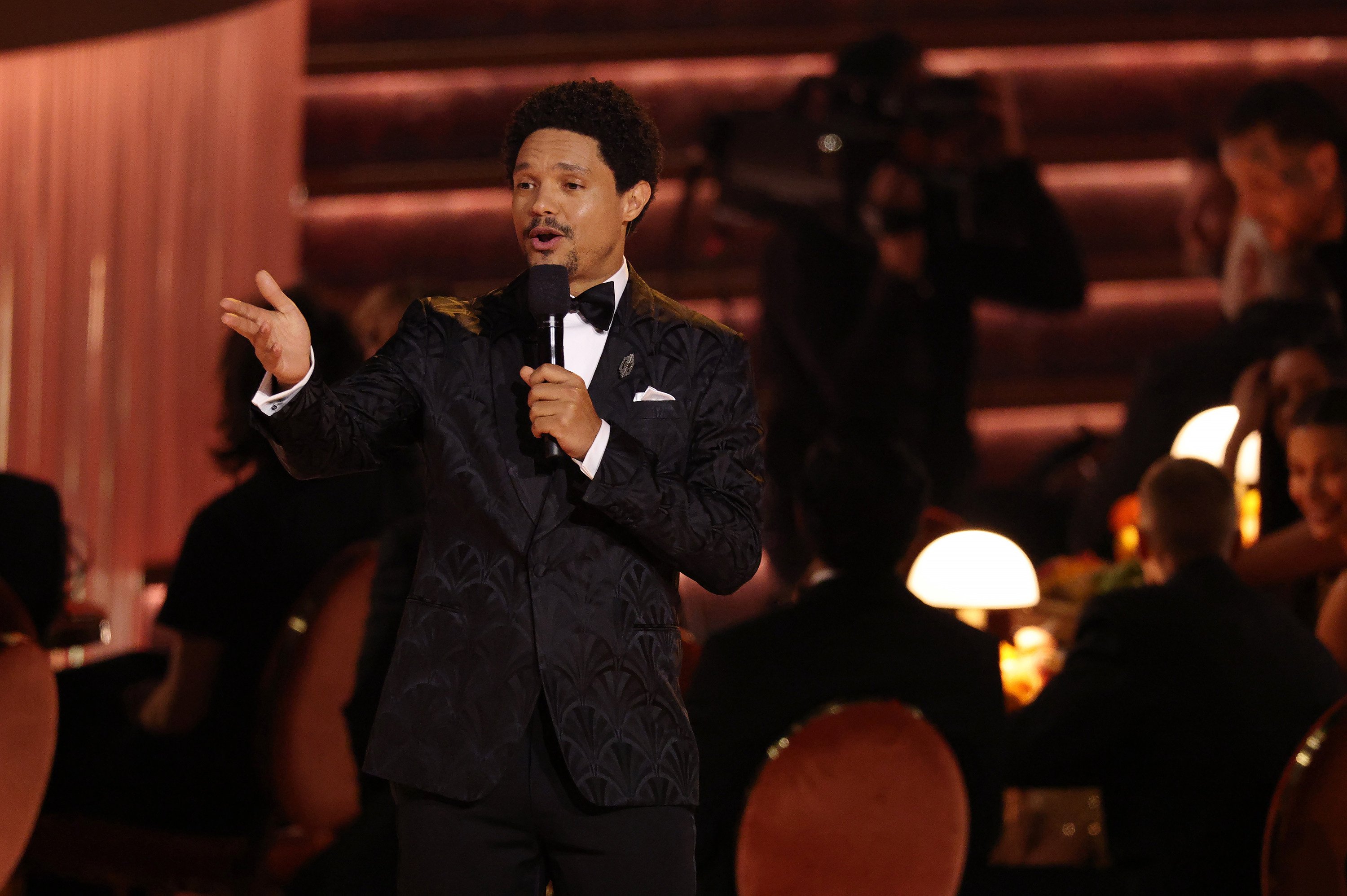 Trevor Noah speaks during his opening monologue at the 68th annual Grammy Awards in Los Angeles on Sunday. Photo: TNS