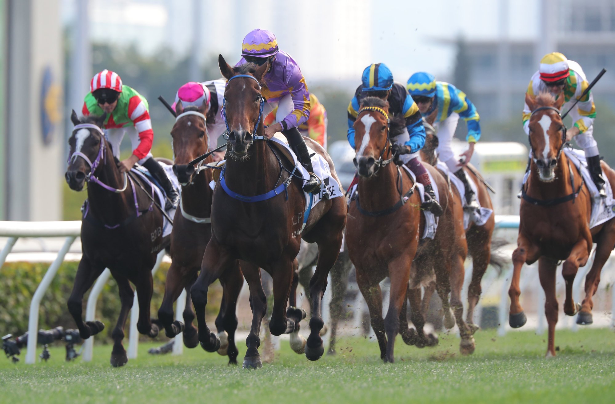 Little Paradise bursts clear of his Classic Mile rivals.