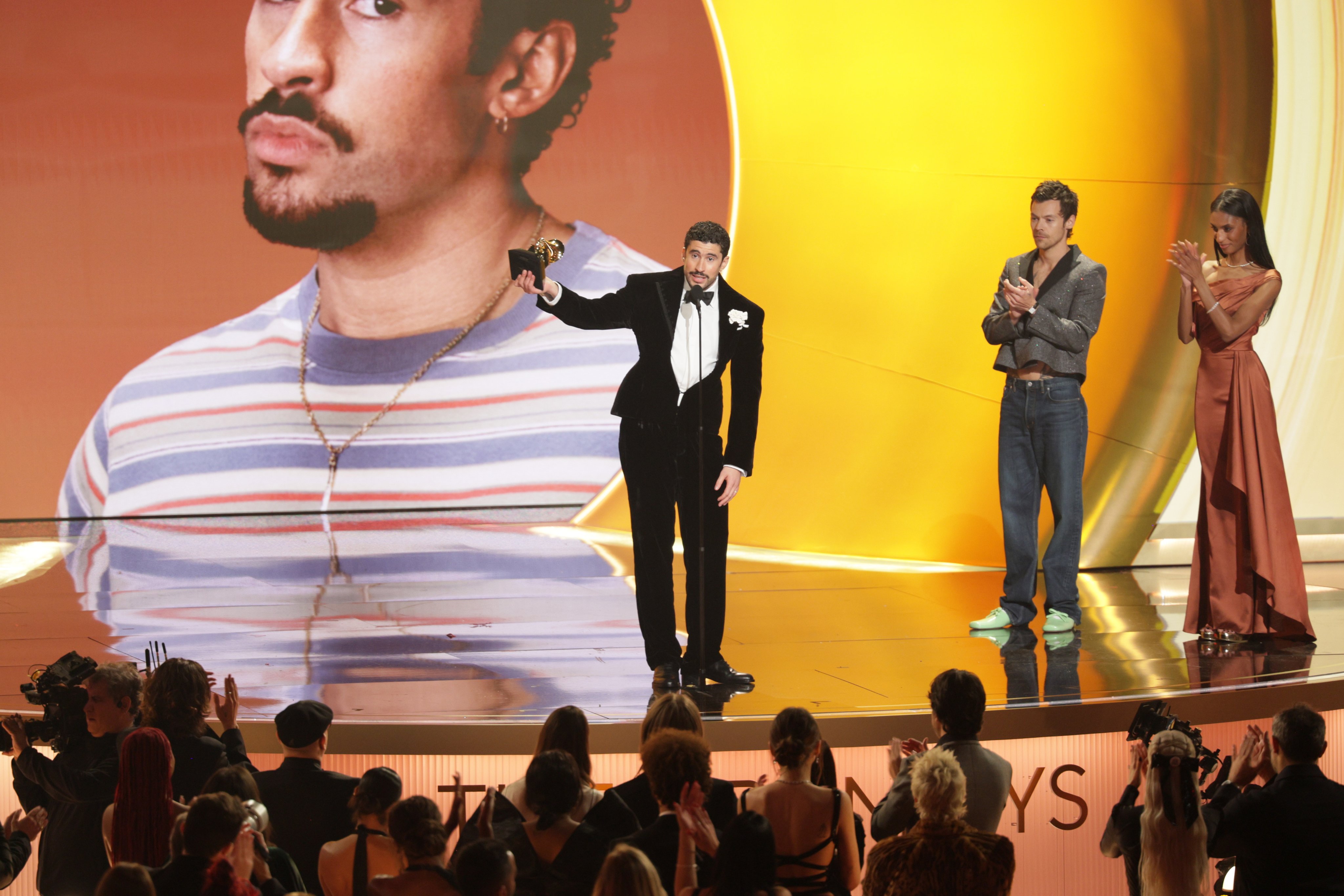 Puerto Rican artist Bad Bunny (left) accepts the award for Album of the Year onstage during the 68th annual Grammy Awards ceremony in Los Angeles, California, US. Photo: EPA