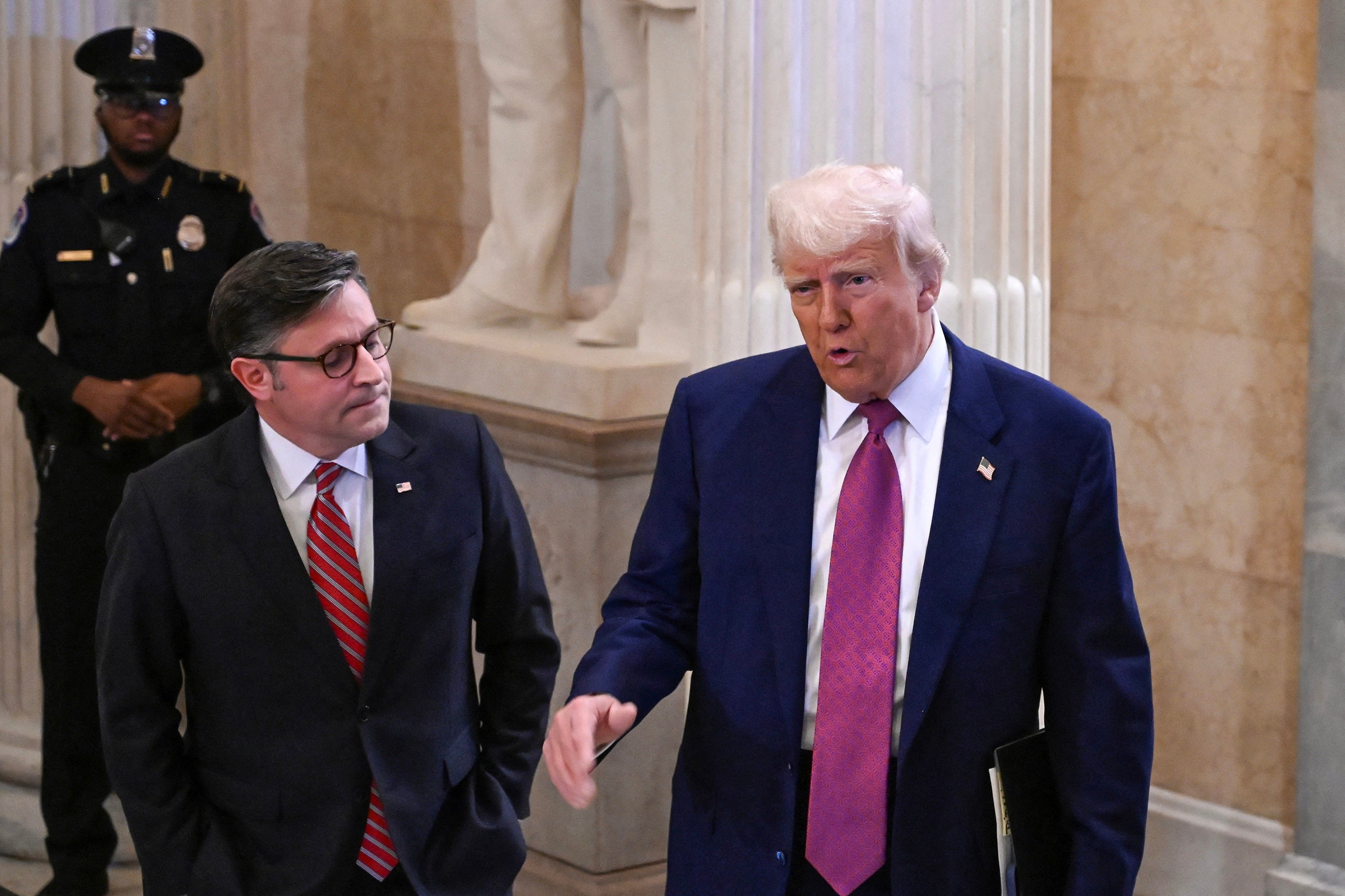 US President Donald Trump, right, and House Speaker Mike Johnson. Photo: AFP / Getty Images / TNS