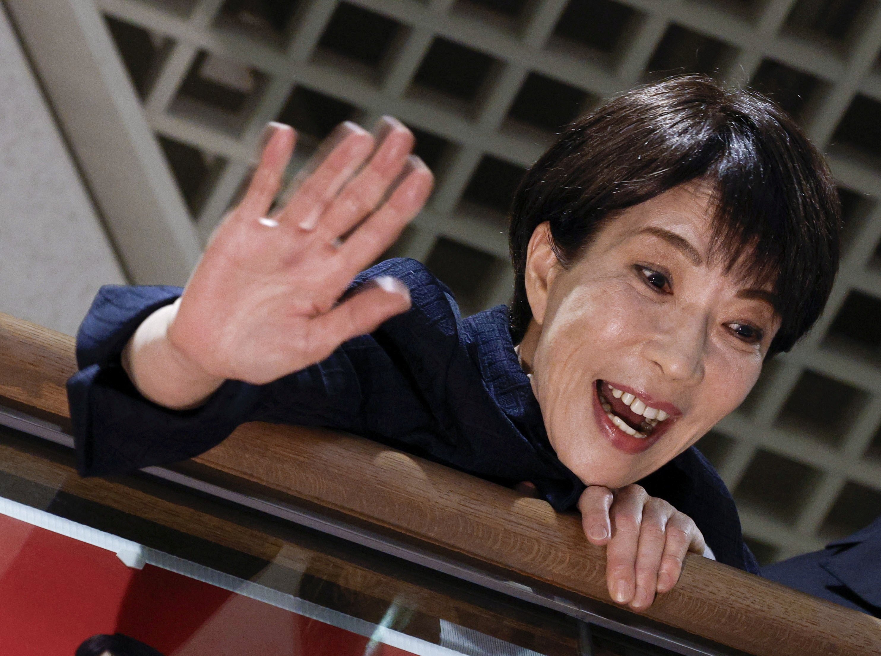 Japanese Prime Minister Sanae Takaichi waves to supporters during an election campaign event in Kawasaki on Saturday. Photo: Kyodo/Reuters