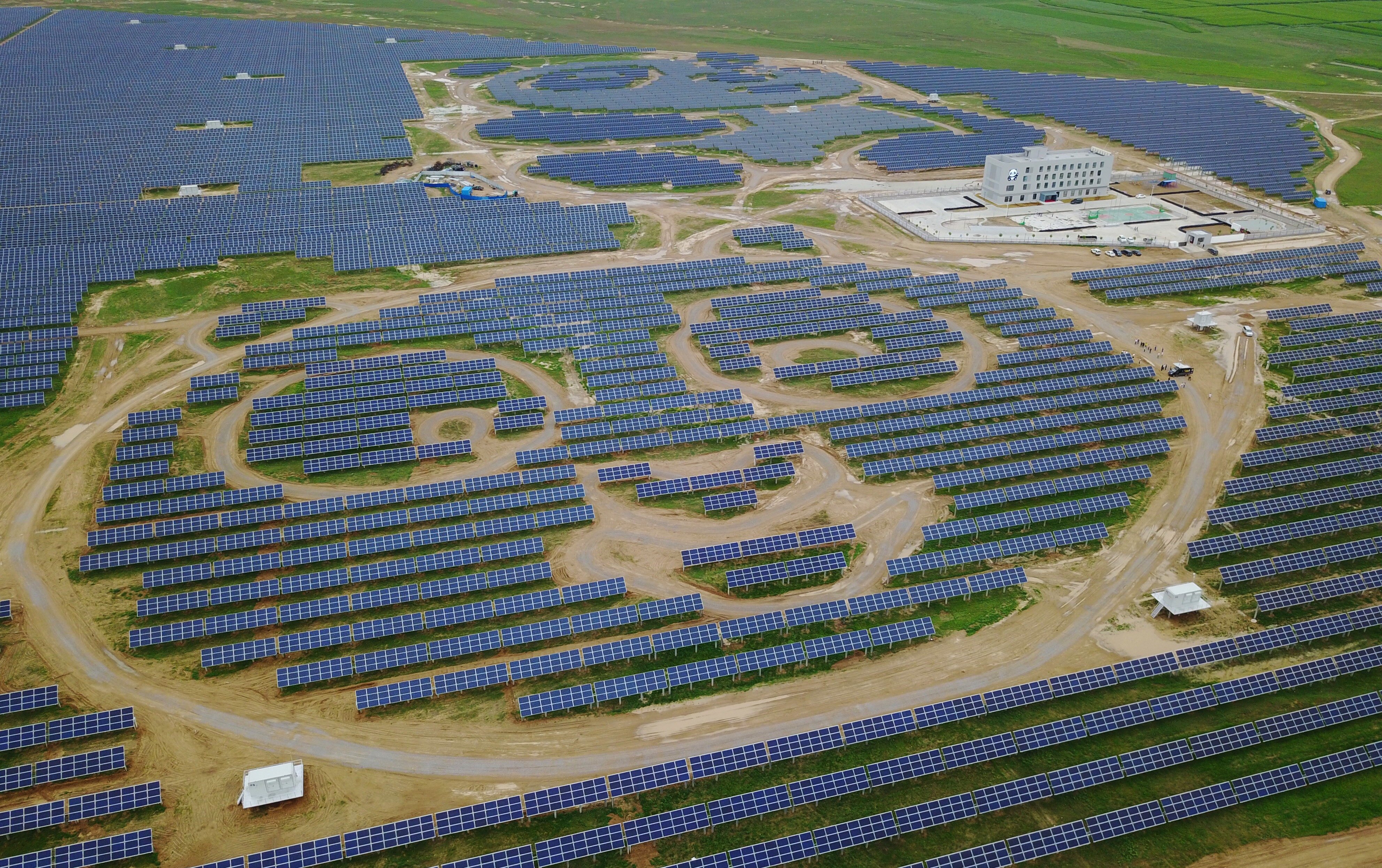 An aerial view of the Datong Panda Power Plant, where solar panels form massive panda patterns in Datong, Shanxi province. Photo: EPA