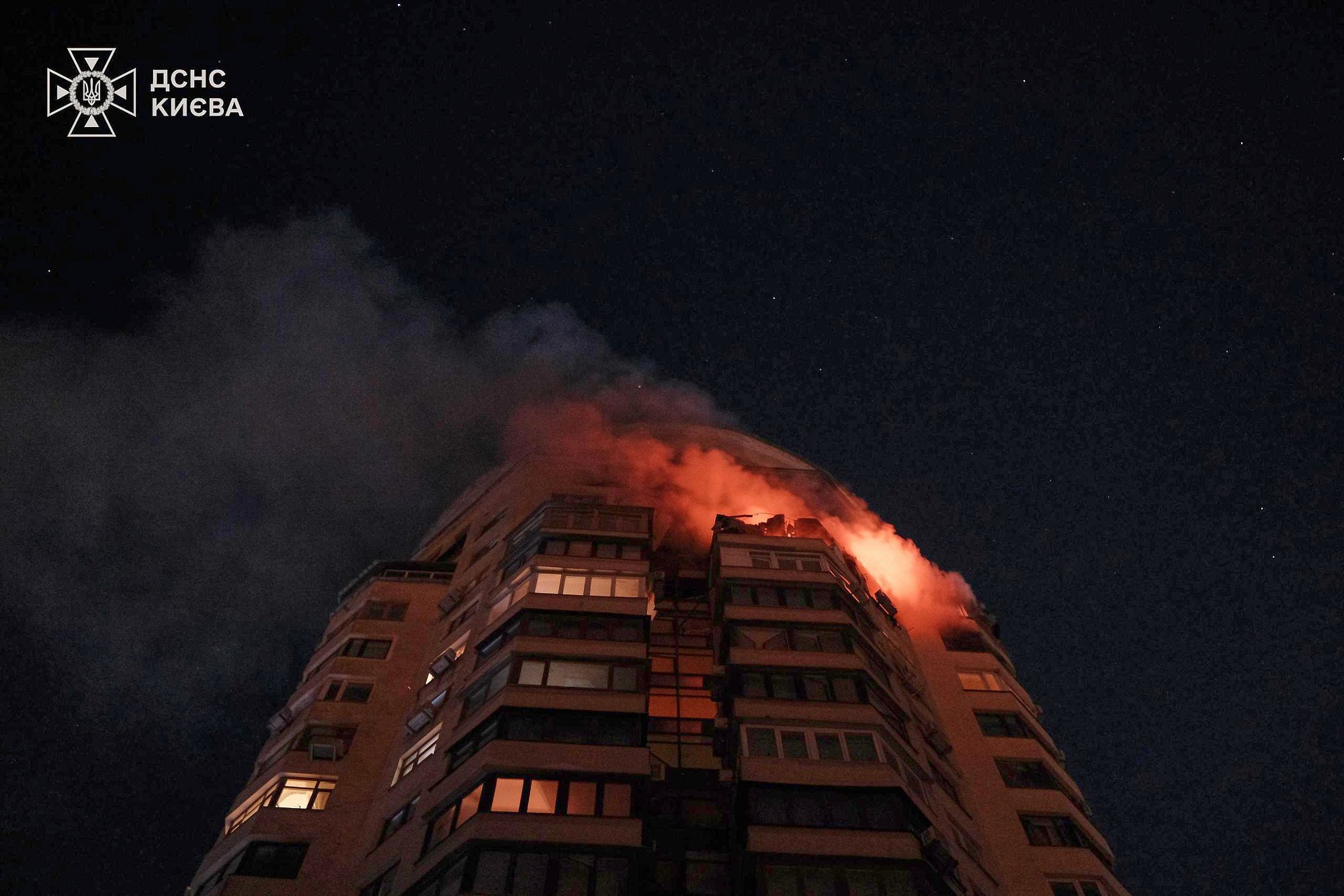 Emergency services personnel battle to extinguish a blaze at a multi-storey residential building after a Russian attack in Kyiv, Ukraine, on Tuesday. Photo: Ukrainian Emergency Service/AP