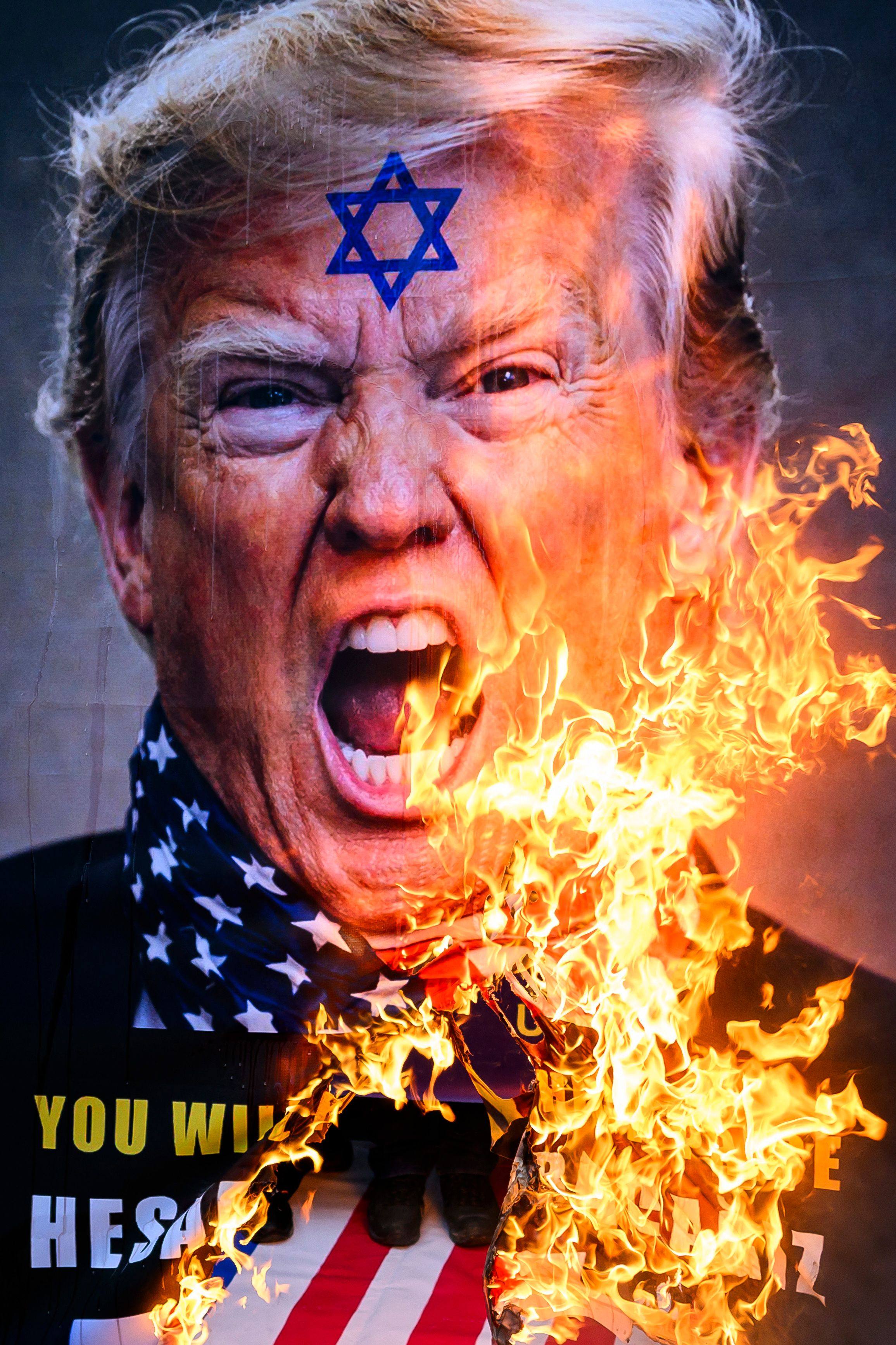 Protesters at an anti-US and anti-Israeli rally in support of the Iranian government, outside the US consulate in Istanbul on Sunday. Photo: AP