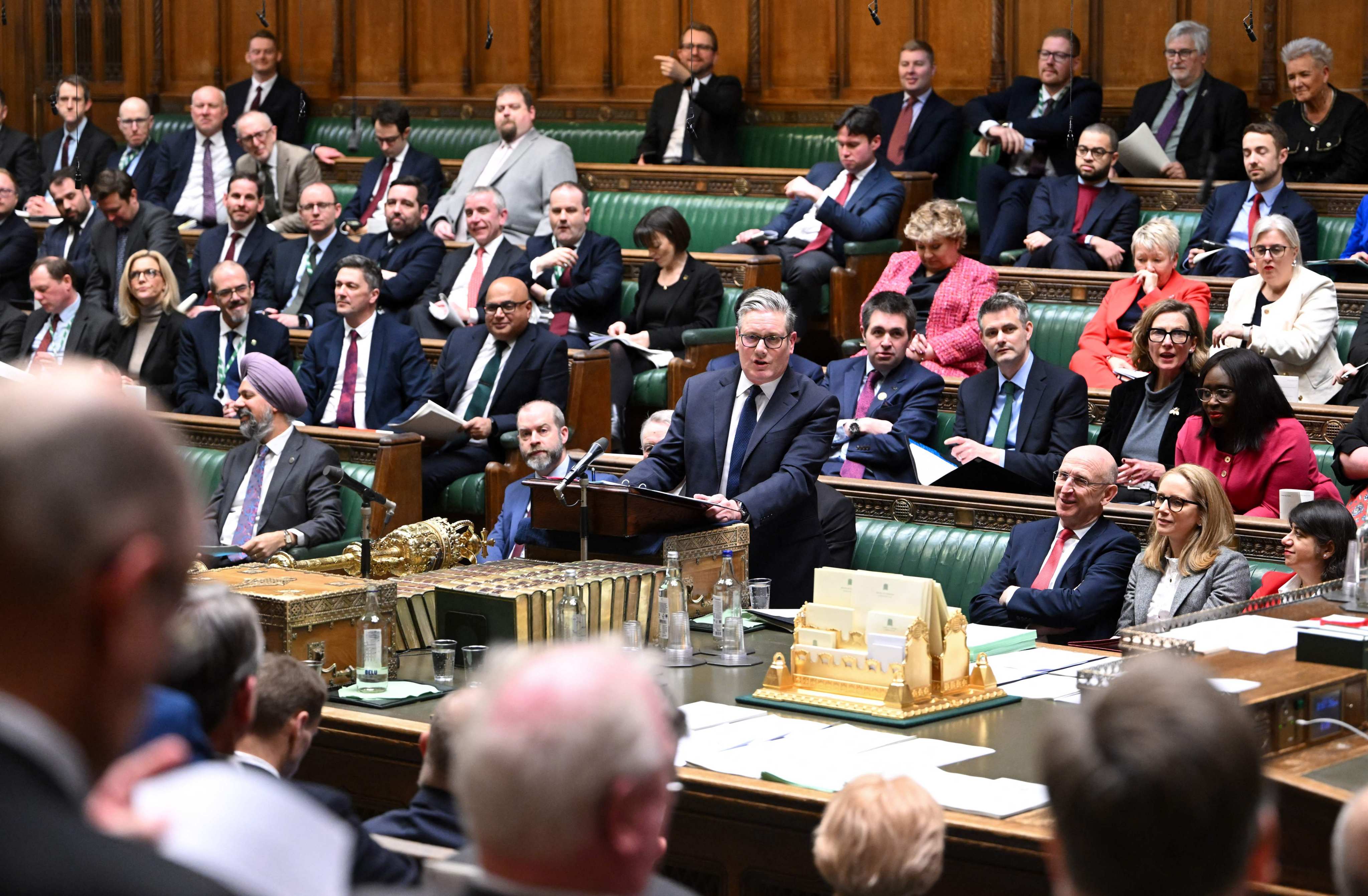 Starmer, centre, makes a statement to MPs following his recent trip to China and Japan, in the House of Commons in London on Monday. Photo: House of Commons / AFP / Handout