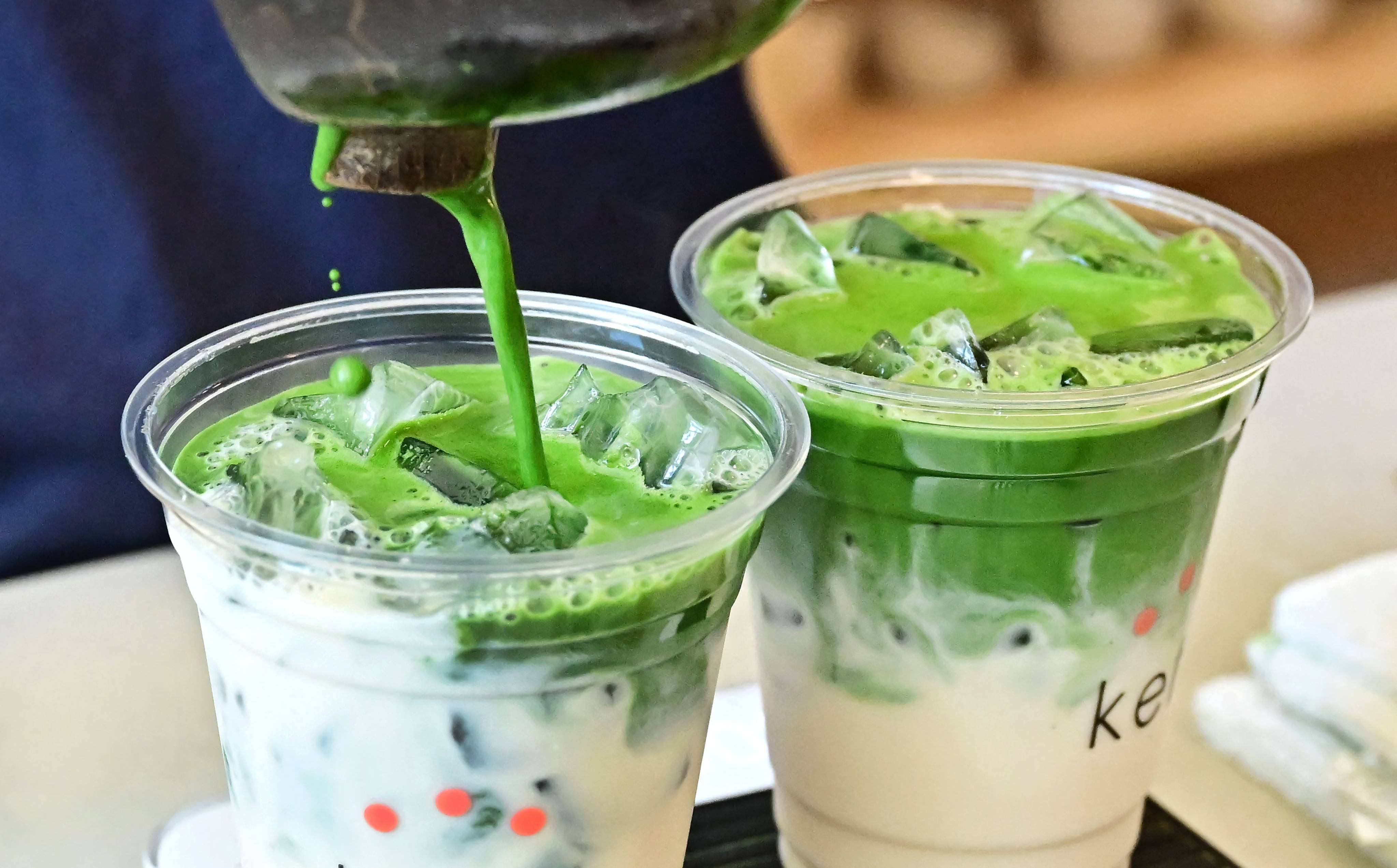 Matcha is added to drinks at a cafe in Los Angeles, California. Matcha, which means “ground tea” in Japanese, comes in the form of a vivid green powder. Photo: AFP