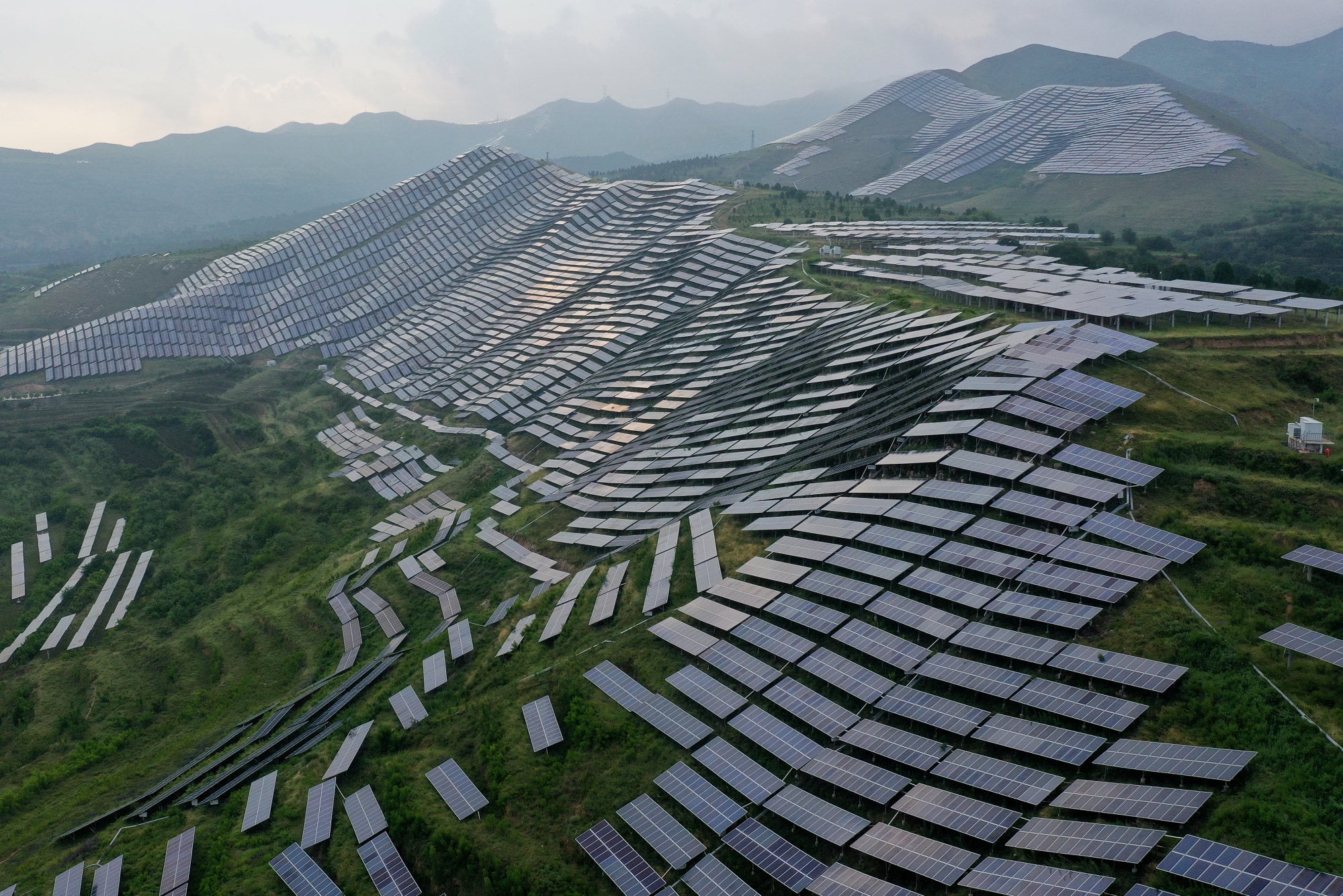 Solar panels are seen in Ruicheng county, Shanxi province, where a shift away from coal-fuelled power has amplified. Photo: Xinhua