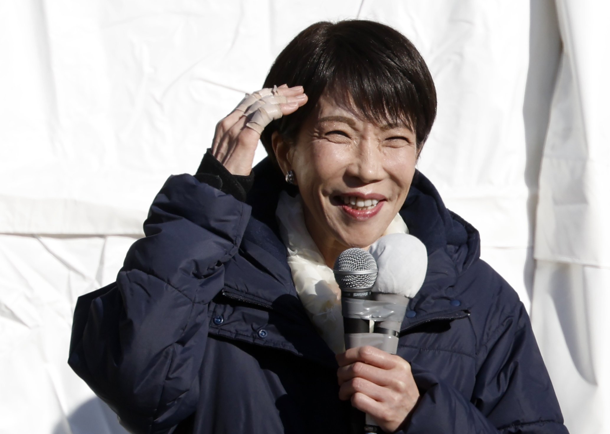 Japanese Prime Minister Sanae Takaichi delivers a speech in support for a local candidate at a campaign rally near Tokyo on Tuesday. Photo: EPA