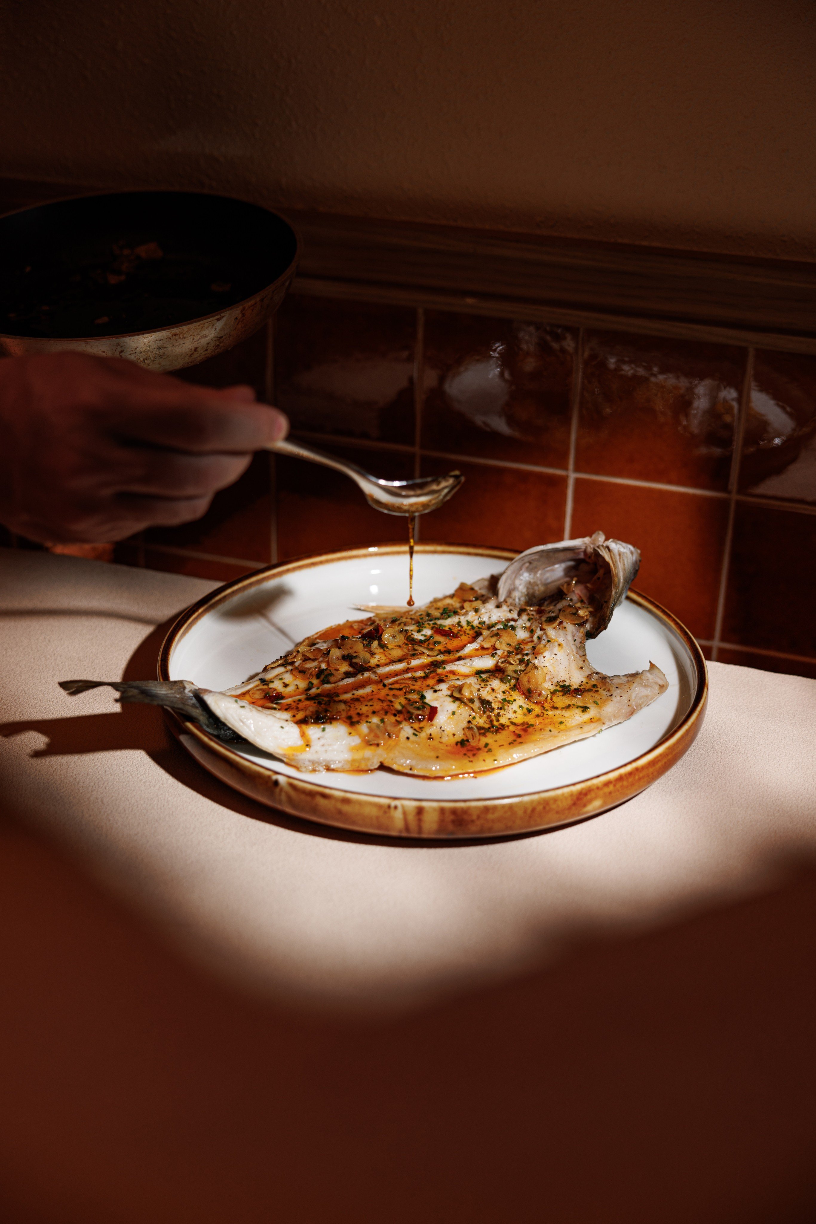 Spanish whole seabass at Aire in Hong Kong’s Causeway Bay neighbourhood, where Eric Chan enjoys casual Spanish food. The chef also shares where he goes in the city for Cantonese comfort food and flavours from his childhood. Photo: Aire