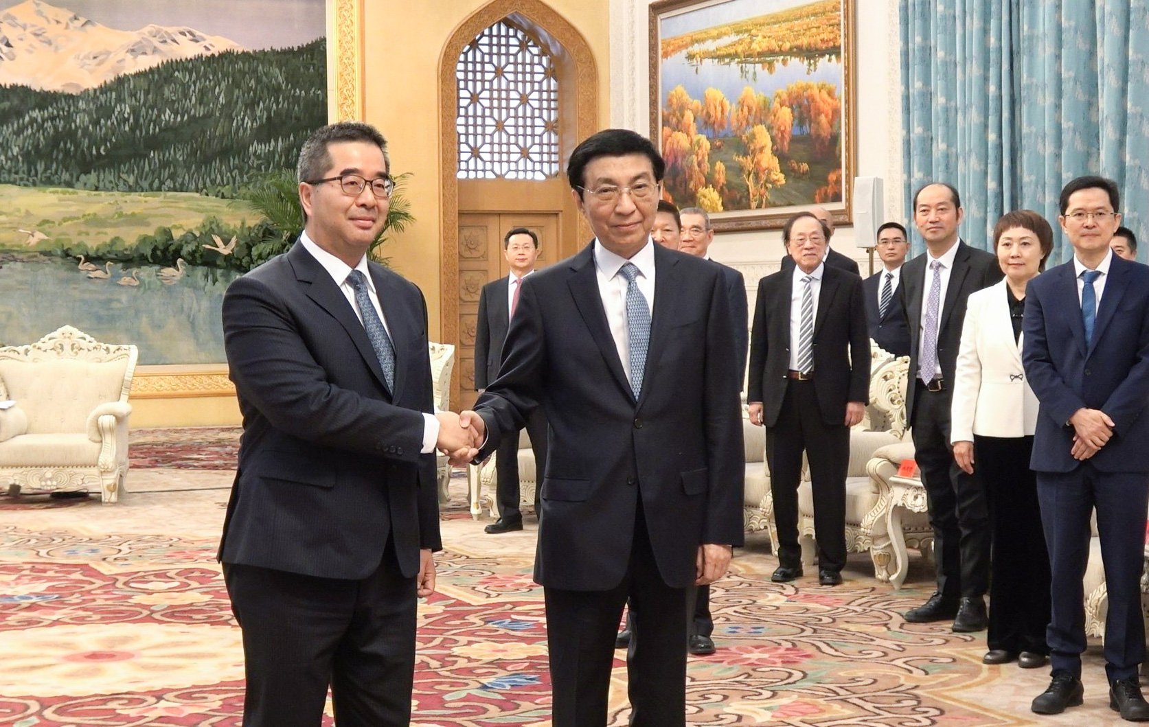 KMT vice-chairman Hsiao Hsu-tsen (left) meets Wang Huning (right), mainland China’s top Taiwan affairs official, on Wednesday in Beijing. Photo: CNA