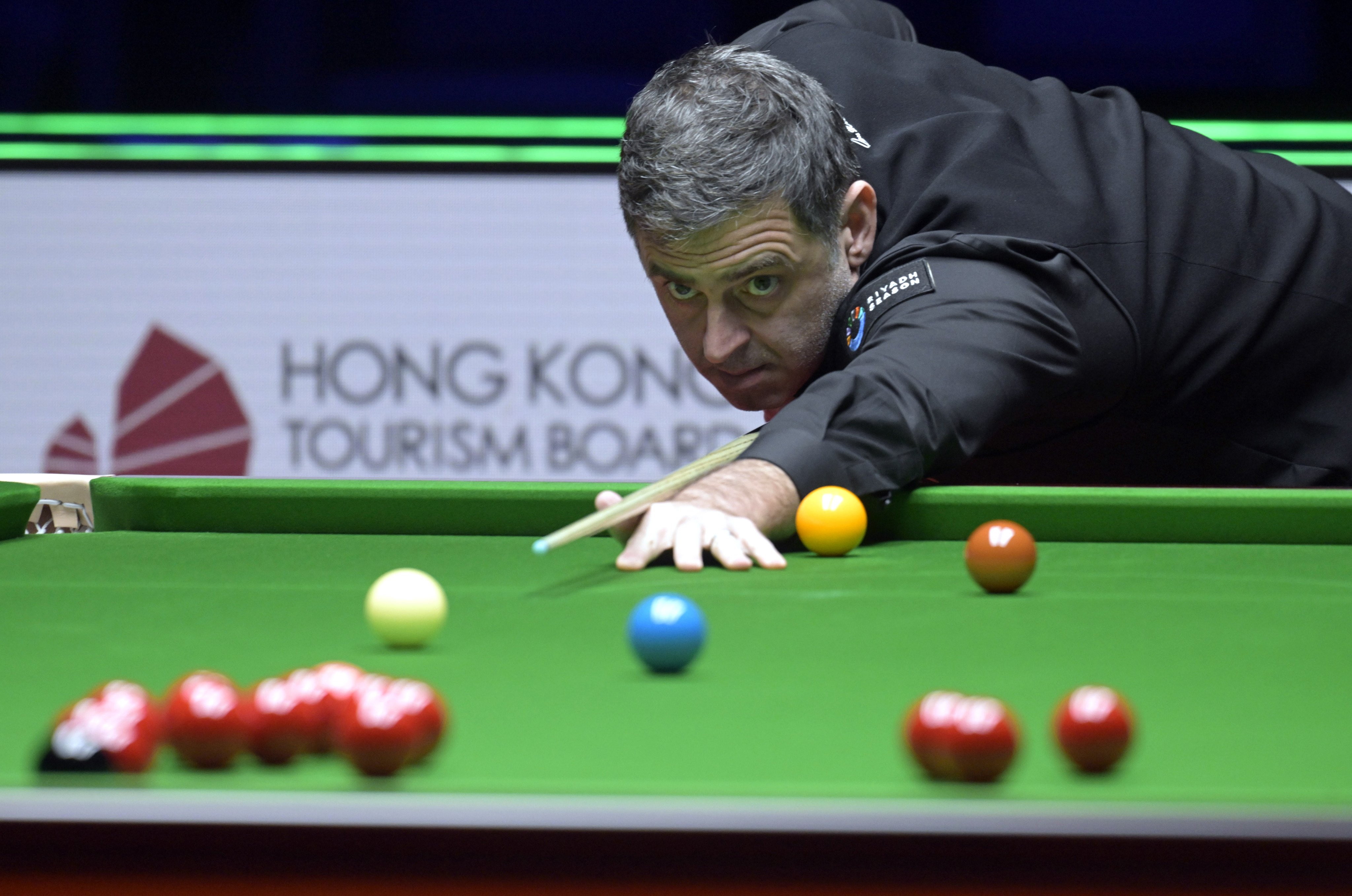 Ronnie O’Sullivan lines up a shot during his victory over Joe O’Connor at World Grand Prix in Hong Kong. Photo: Xinhua