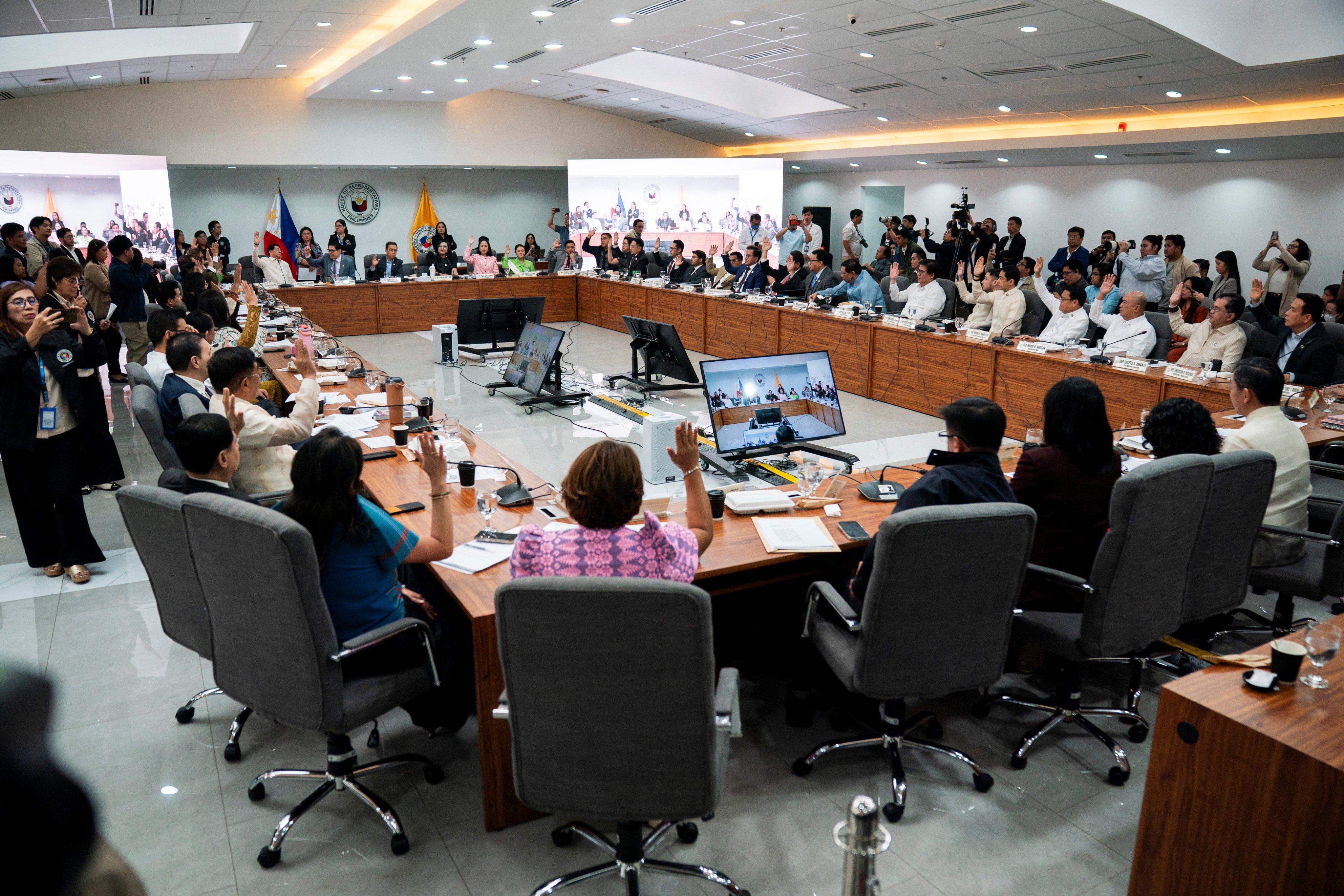 A Philippine house panel votes on the impeachment complaints against President Ferdinand Marcos Jr. as lacking in substance, at the House of Representatives in Quezon City, Philippines, February 4, 2026. REUTERS/Lisa Marie David