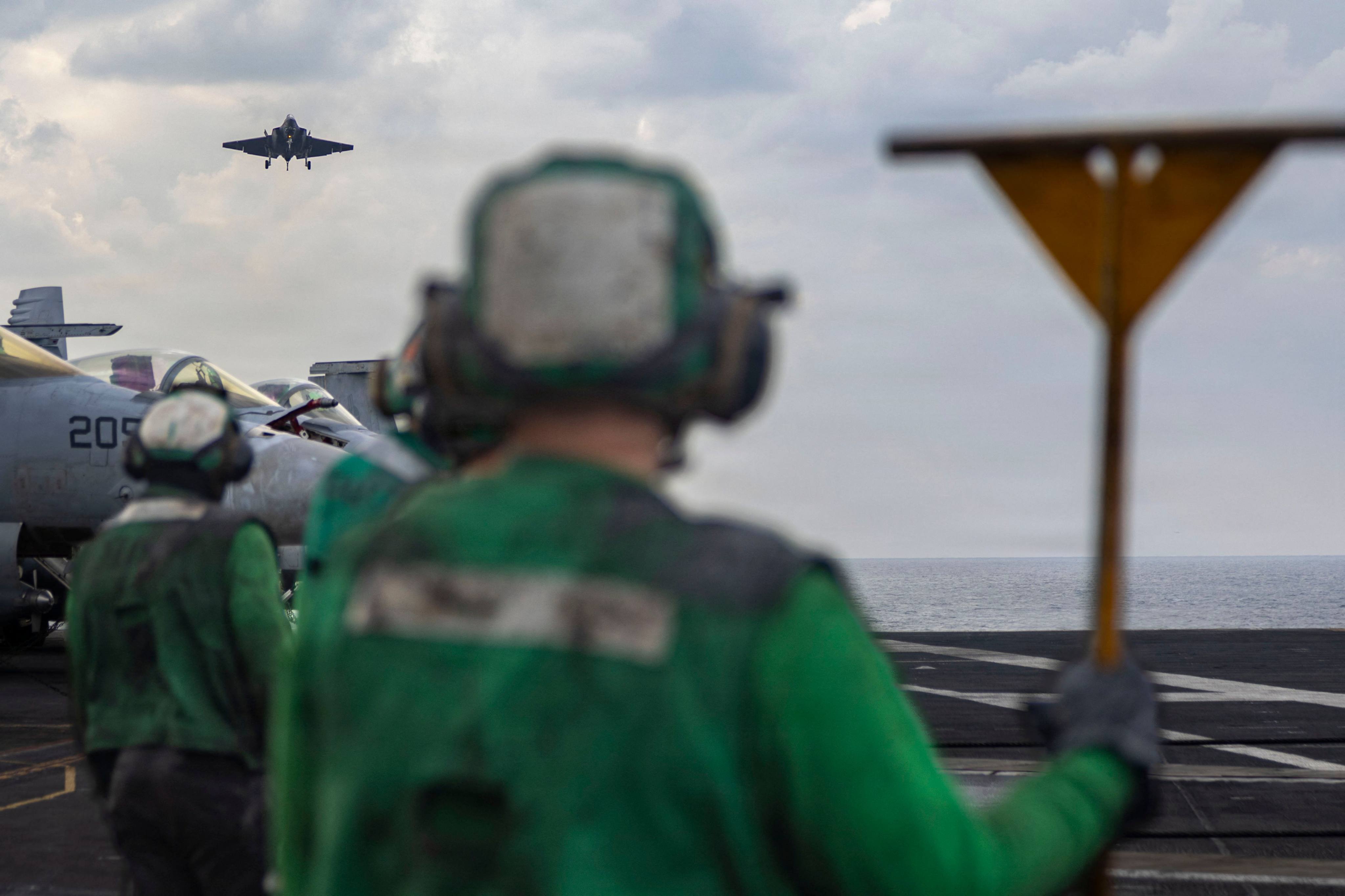 An F-35C Lightning II prepares to land on the flight deck of the USS Abraham Lincoln on January 28. Photo: US Navy via AFP