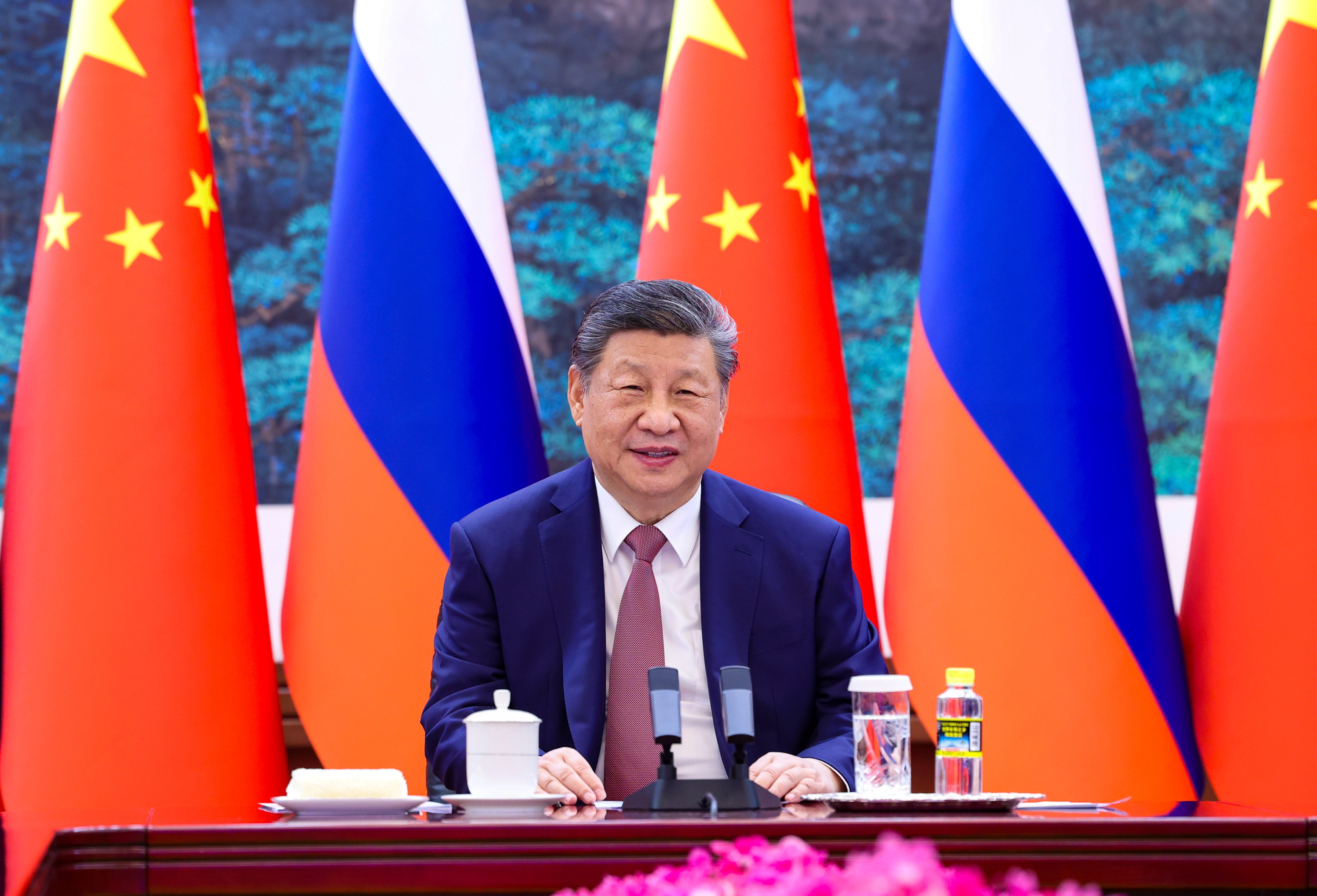 Chinese President Xi Jinping holds a video call with his Russian counterpart on Wednesday. Photo: Xinhua