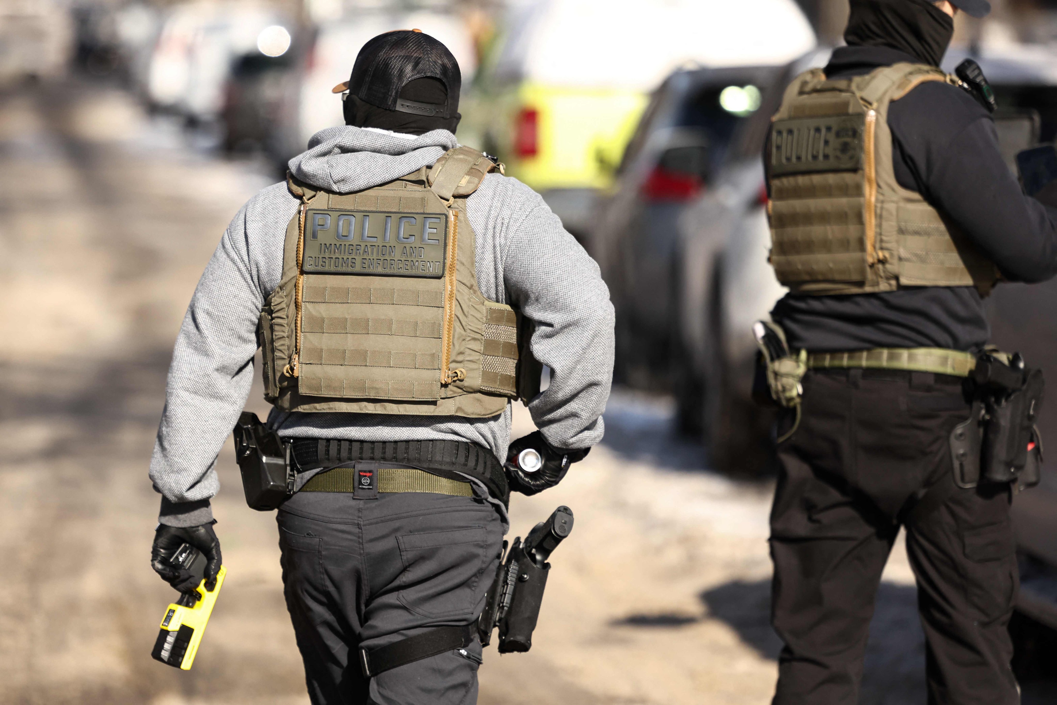 Federal agents are seen during an anti-immigration raid in Minneapolis, Minnesota on Tuesday. Photo: AFP