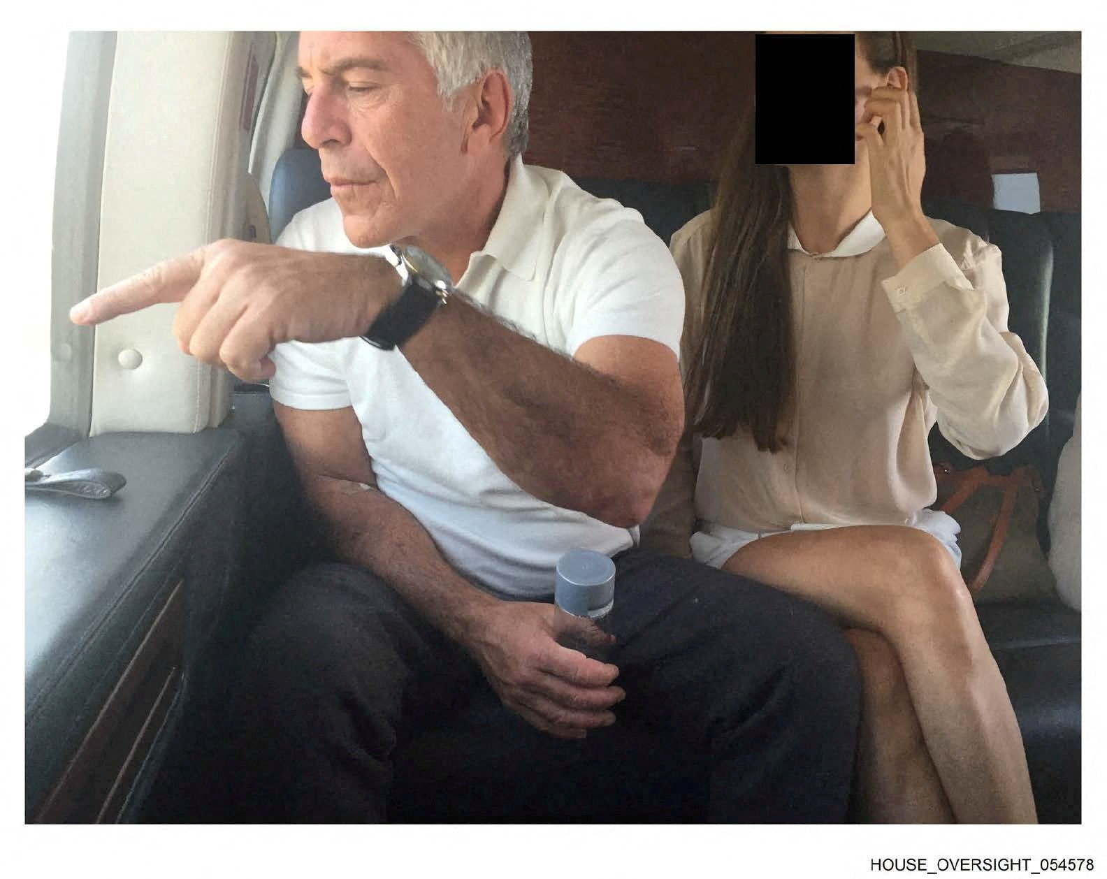 Jeffrey Epstein and a woman, whose identity has been obscured, in an image from the Epstein estate released on December 18, 2025. Photo: House Oversight Committee Democrats via Reuters