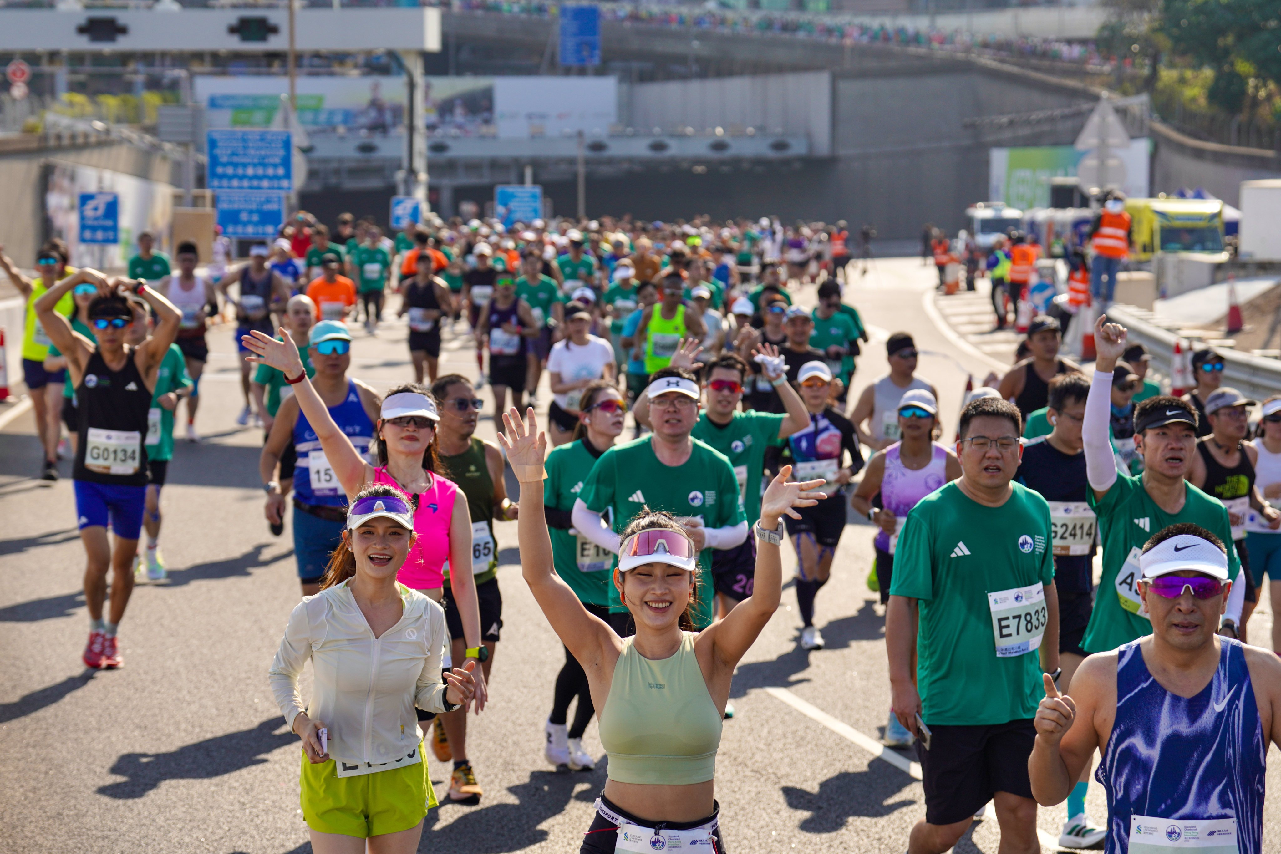 Runners taking part in the 2026 Standard Chartered Hong Kong Marathon arrive in Sheung Wan after passing through the Western Harbour Crossing. Photo: Karma Lo
